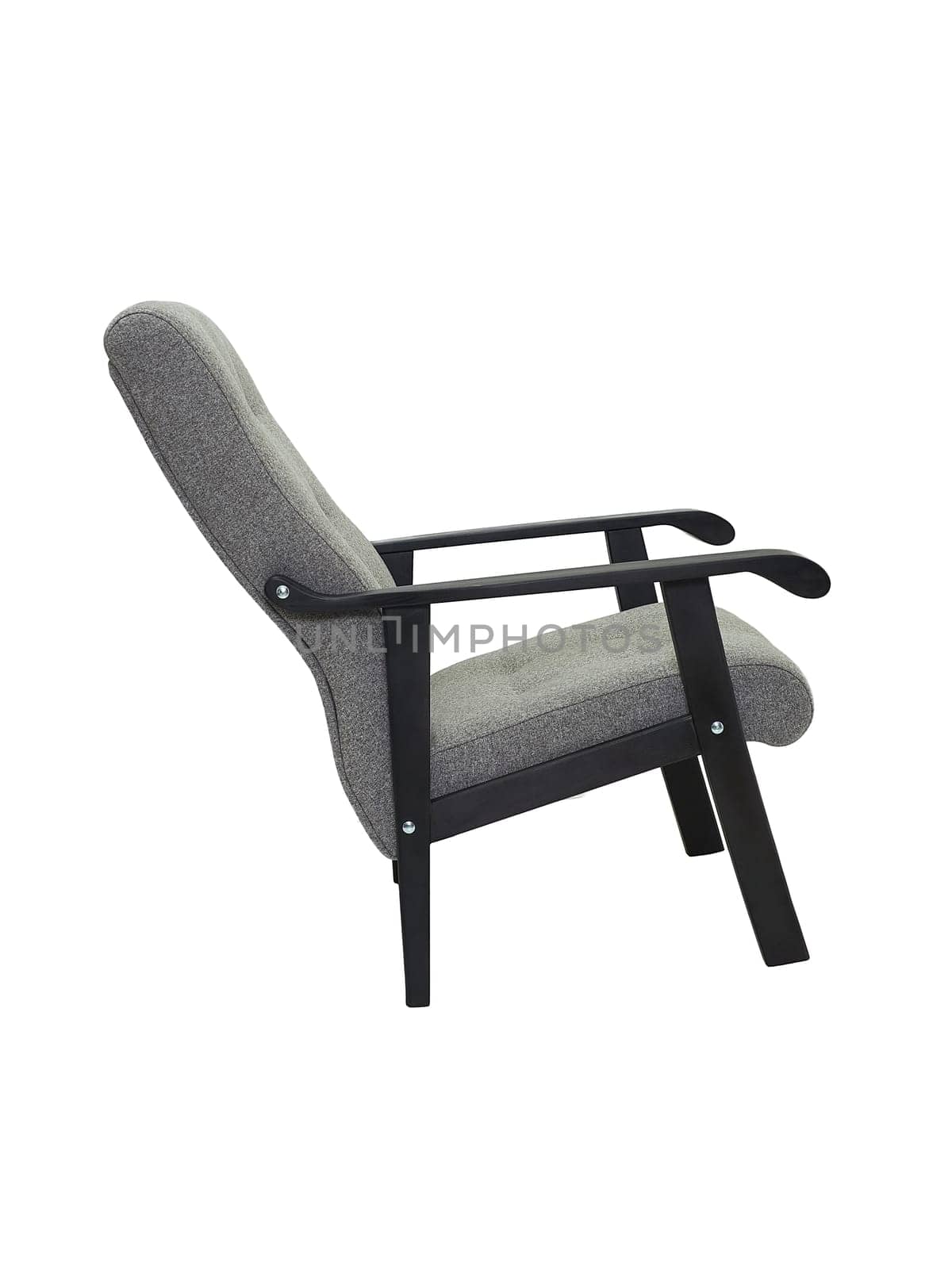 gray fabric armchair with wooden elbow and legs isolated on white background, side view. modern furniture, interior, home design in minimal style