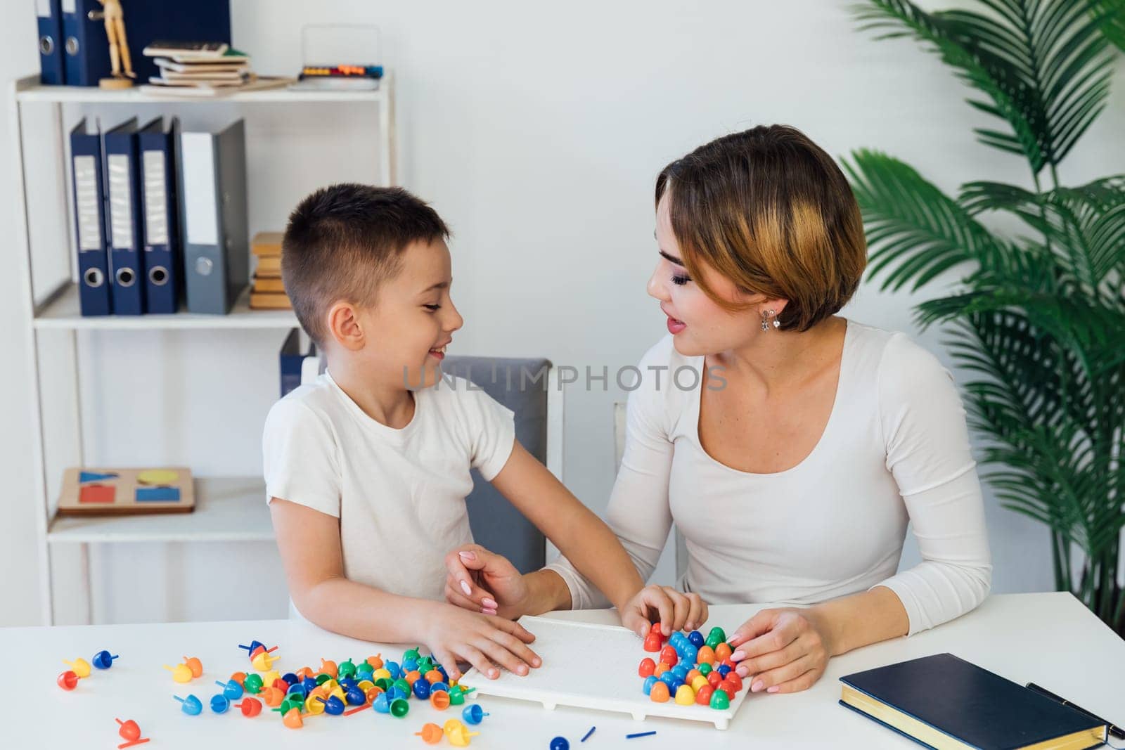 in the psychologist's office educational games work with the child fine motor skills mosaic