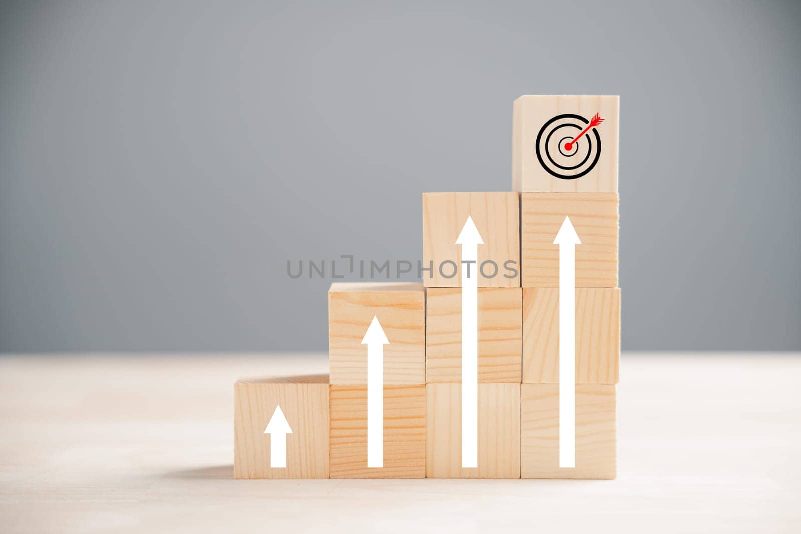 Wooden blocks with Target icon on top by Sorapop