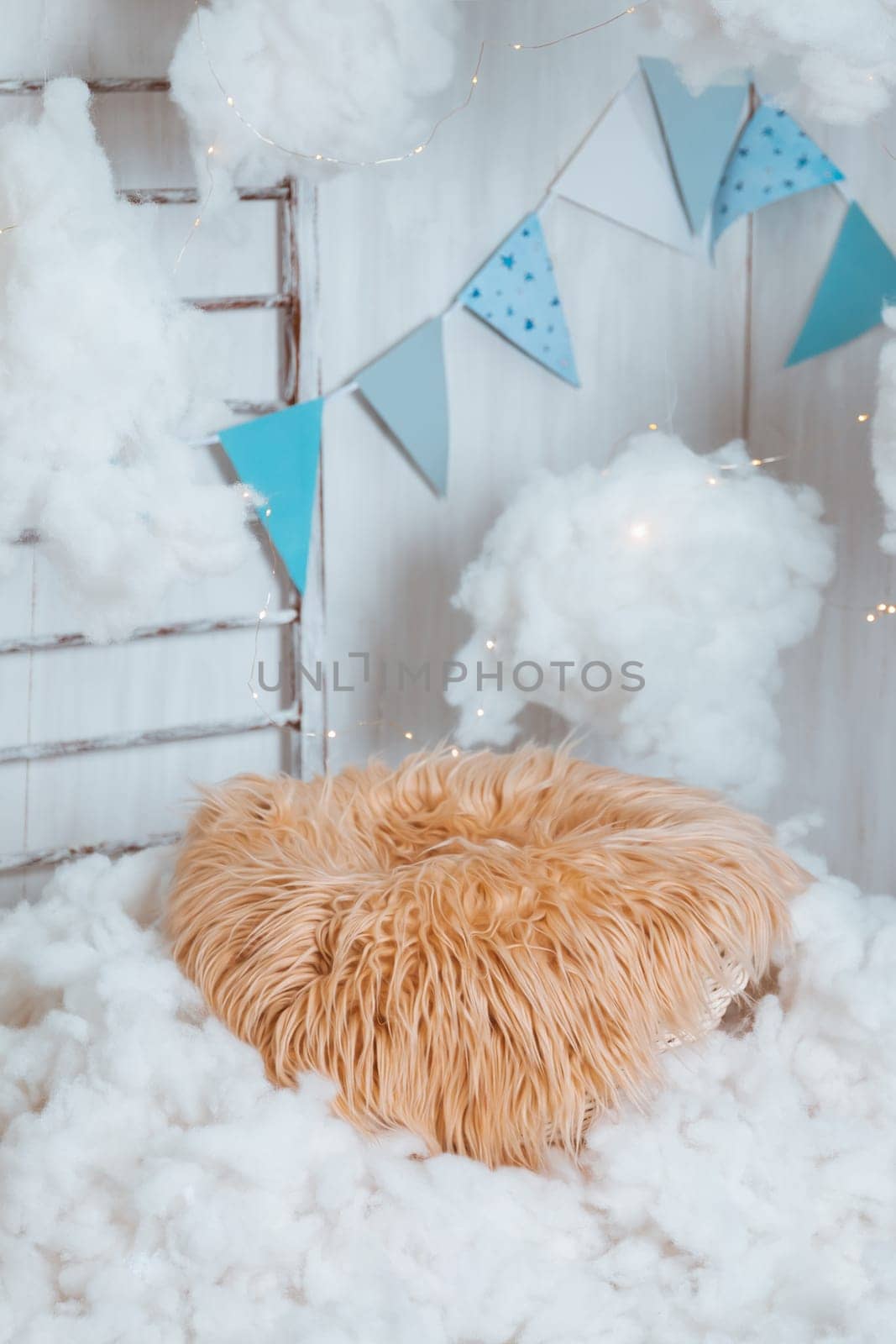 Photo zone for newborns - a basket with fur in the clouds with stars, stairs and flags by ElenaNEL