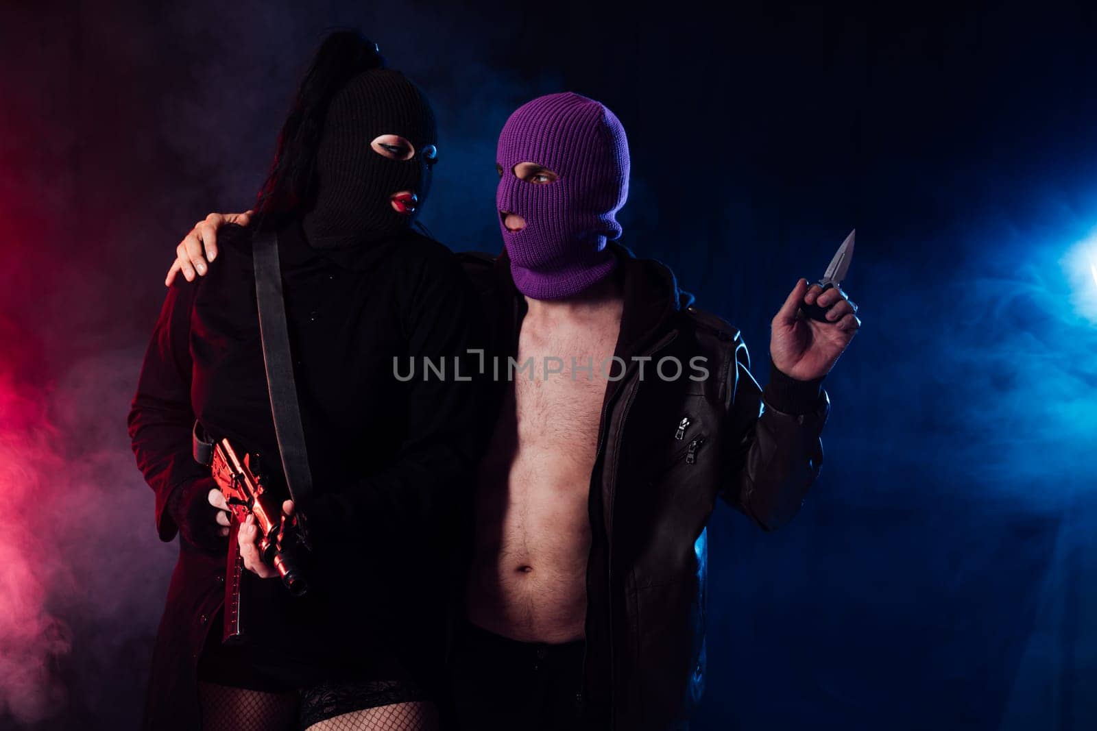 a bandits with a machine gun in a dark room