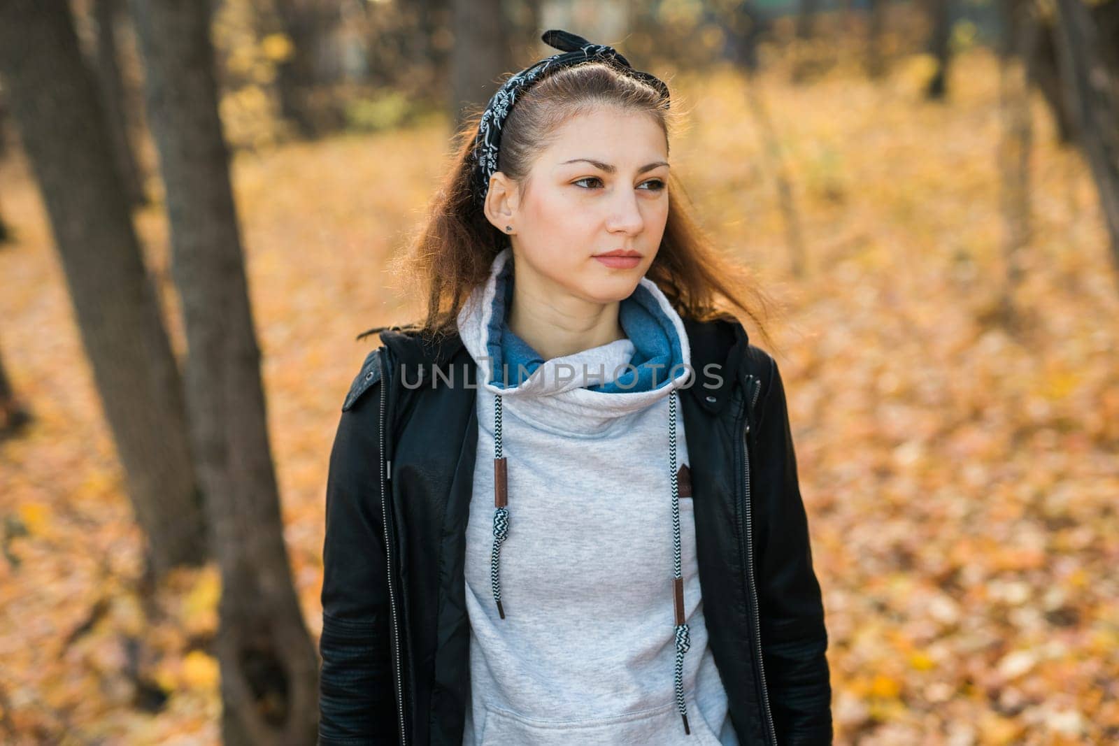 Outdoor atmospheric lifestyle portrait of young beautiful young woman. Warm autumn fall season by Satura86