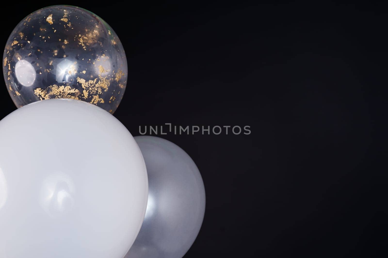 Dark background with large light balls. space for text. Greeting Card. High quality photo