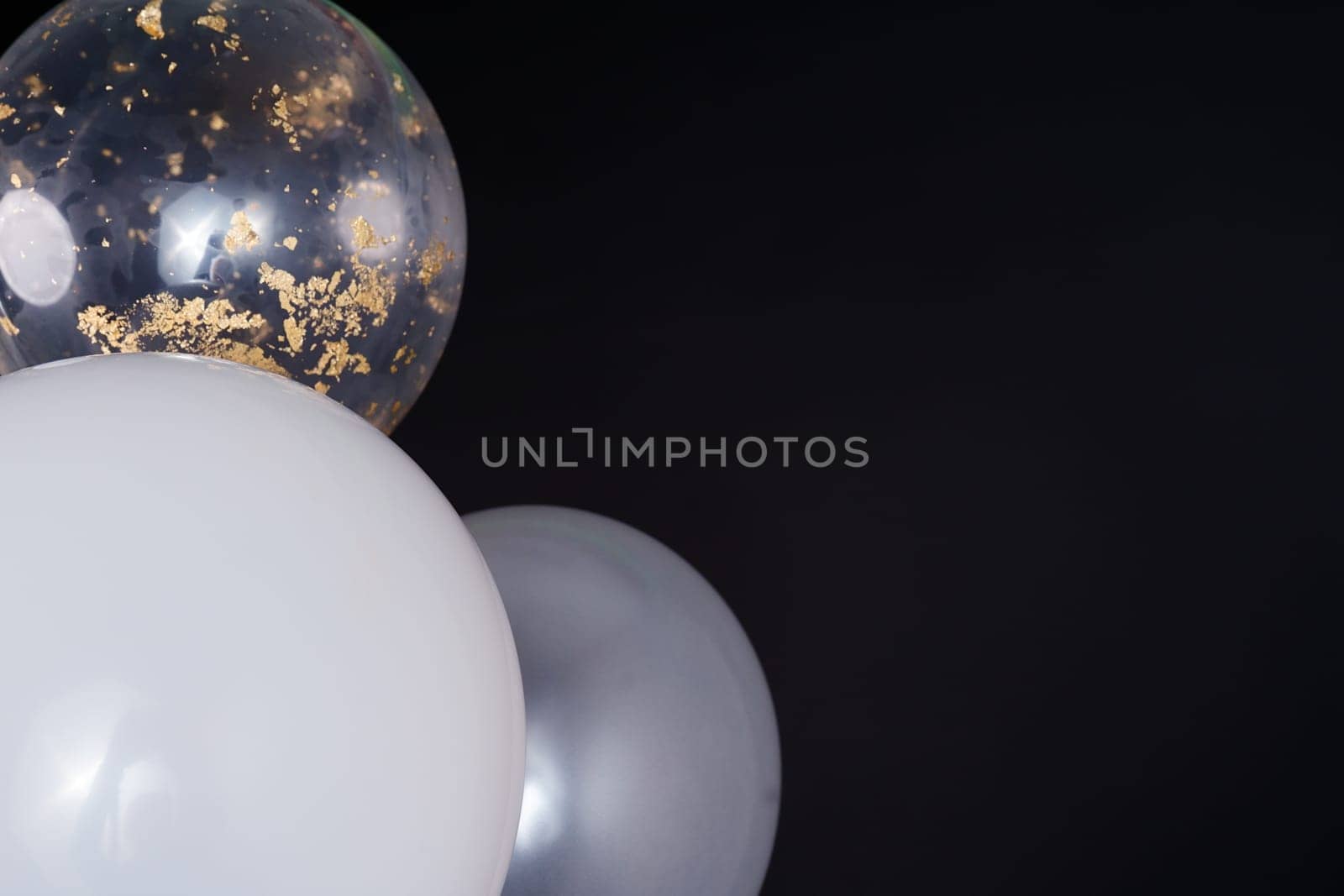 Dark background with large light balls. space for text. Greeting Card. High quality photo