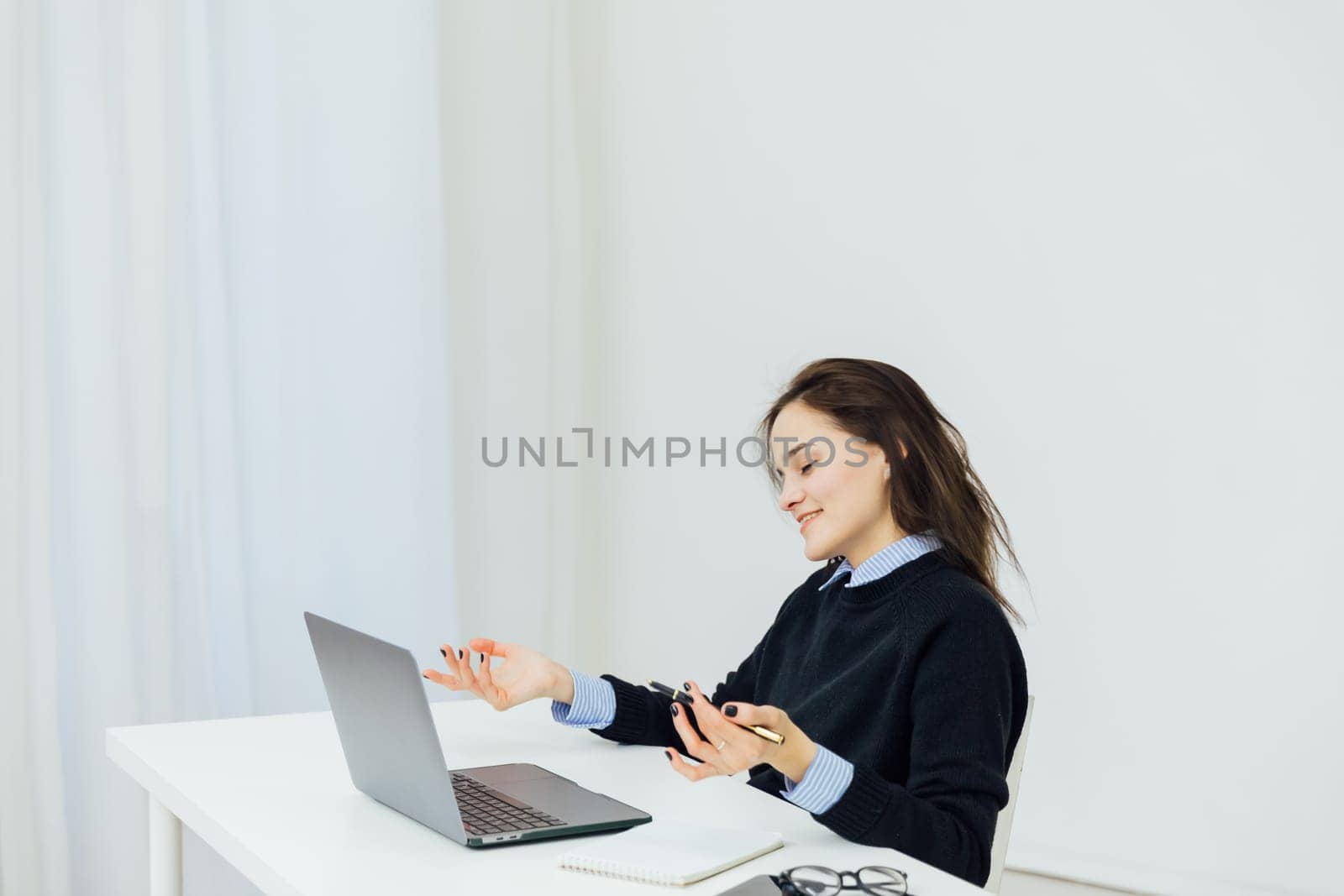 IT work communication online training woman at the computer in the office on remote work Internet communication