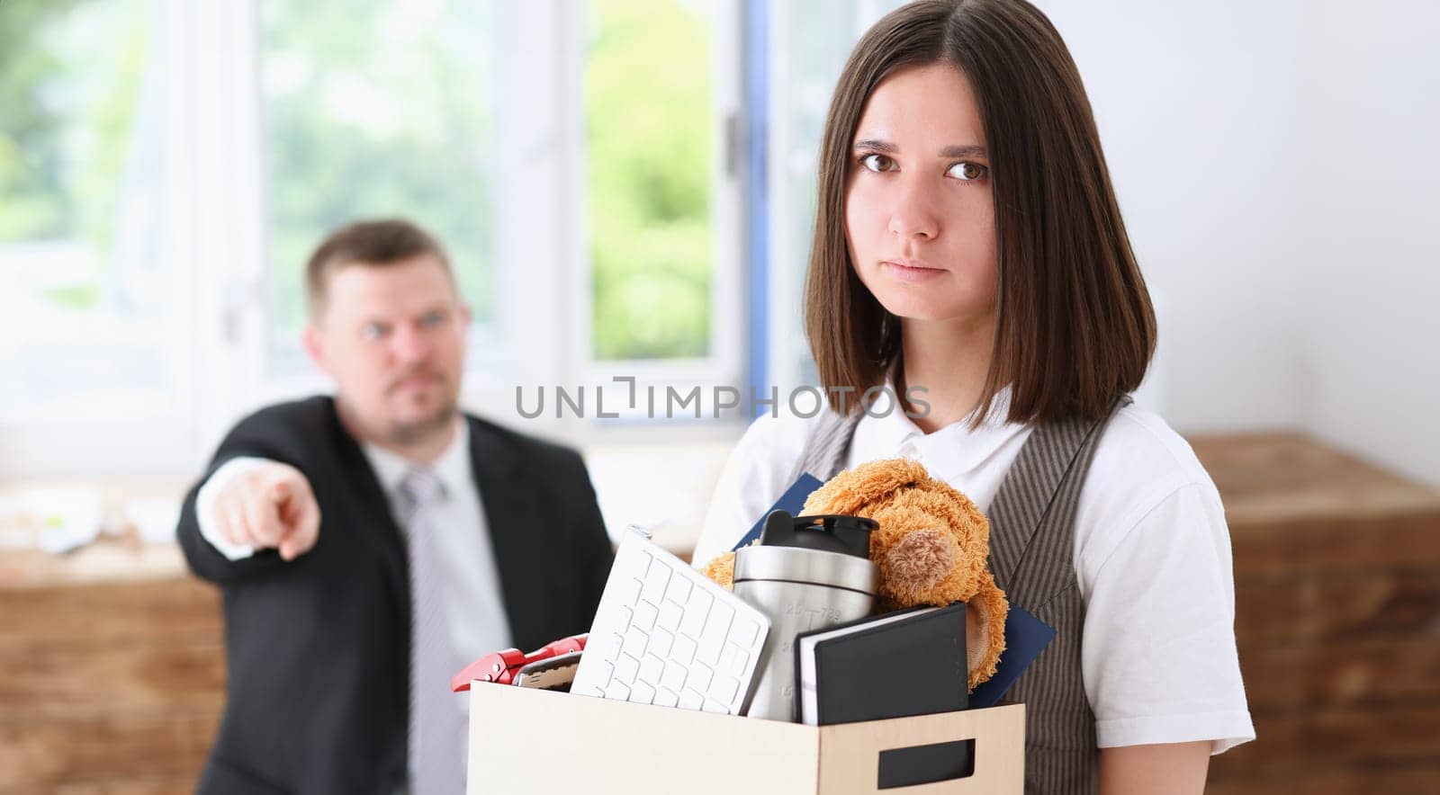 Angry yelling boss point arm to exit dismissing sad worker with stuff box portrait. Bad news pack and carry belongings hopeless human resources staff reduction hr get upset give sack concept