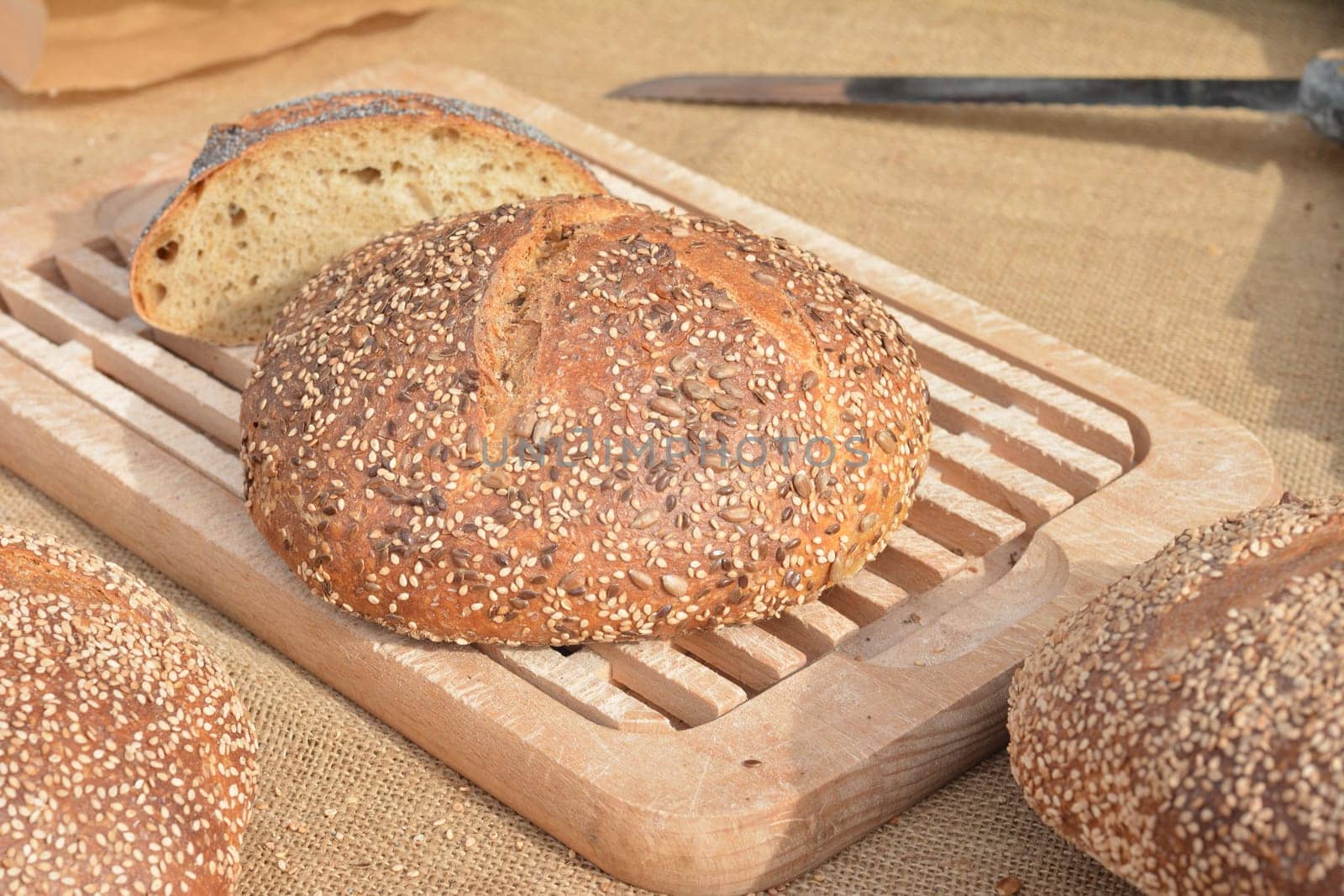 Multi grain bread bio on wood cutting board