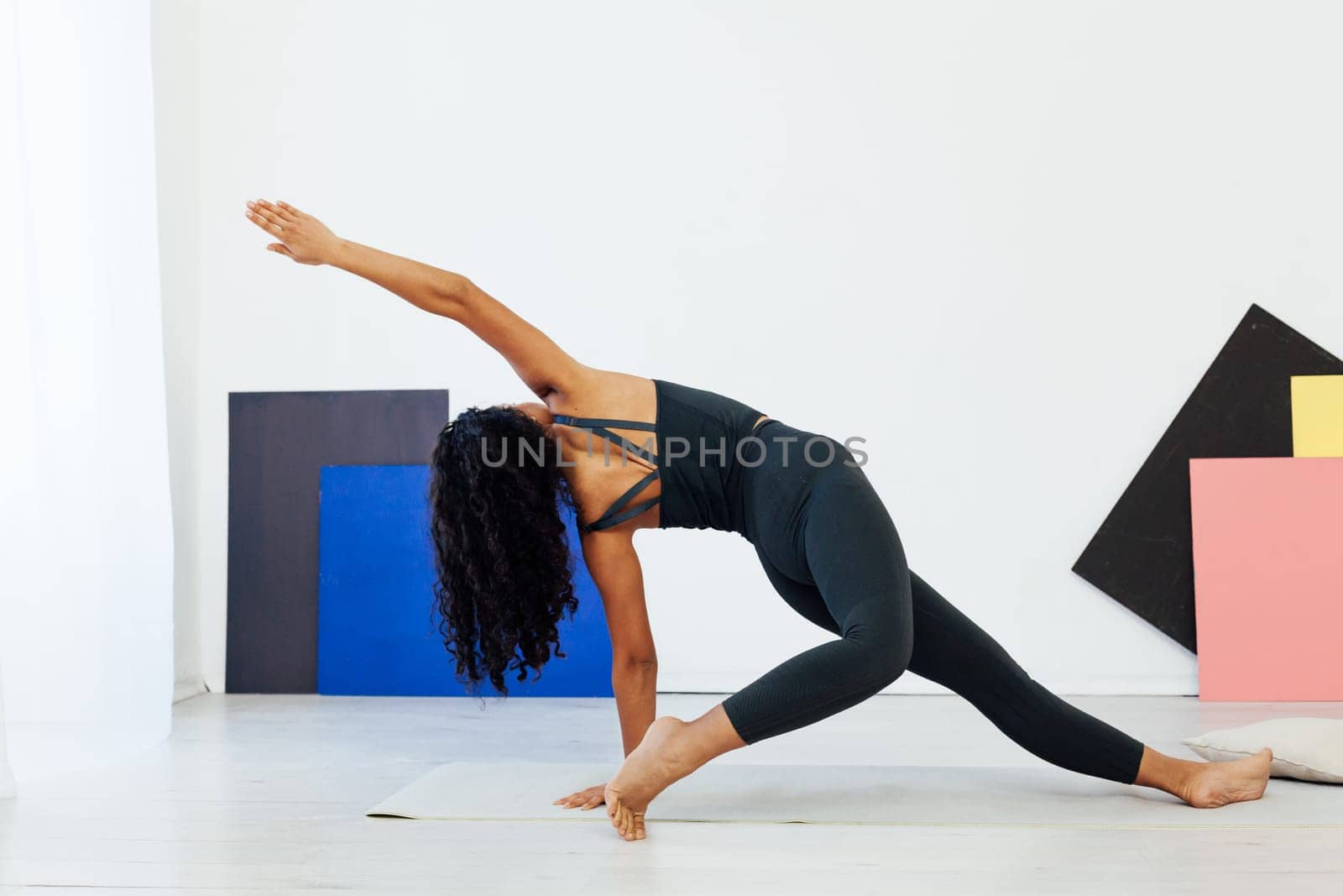 exercises woman doing yoga relaxation classes stretching postures by Simakov