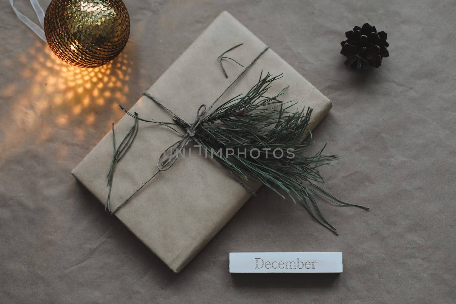 Christmas composition. Gifts, fir tree branches, red decorations