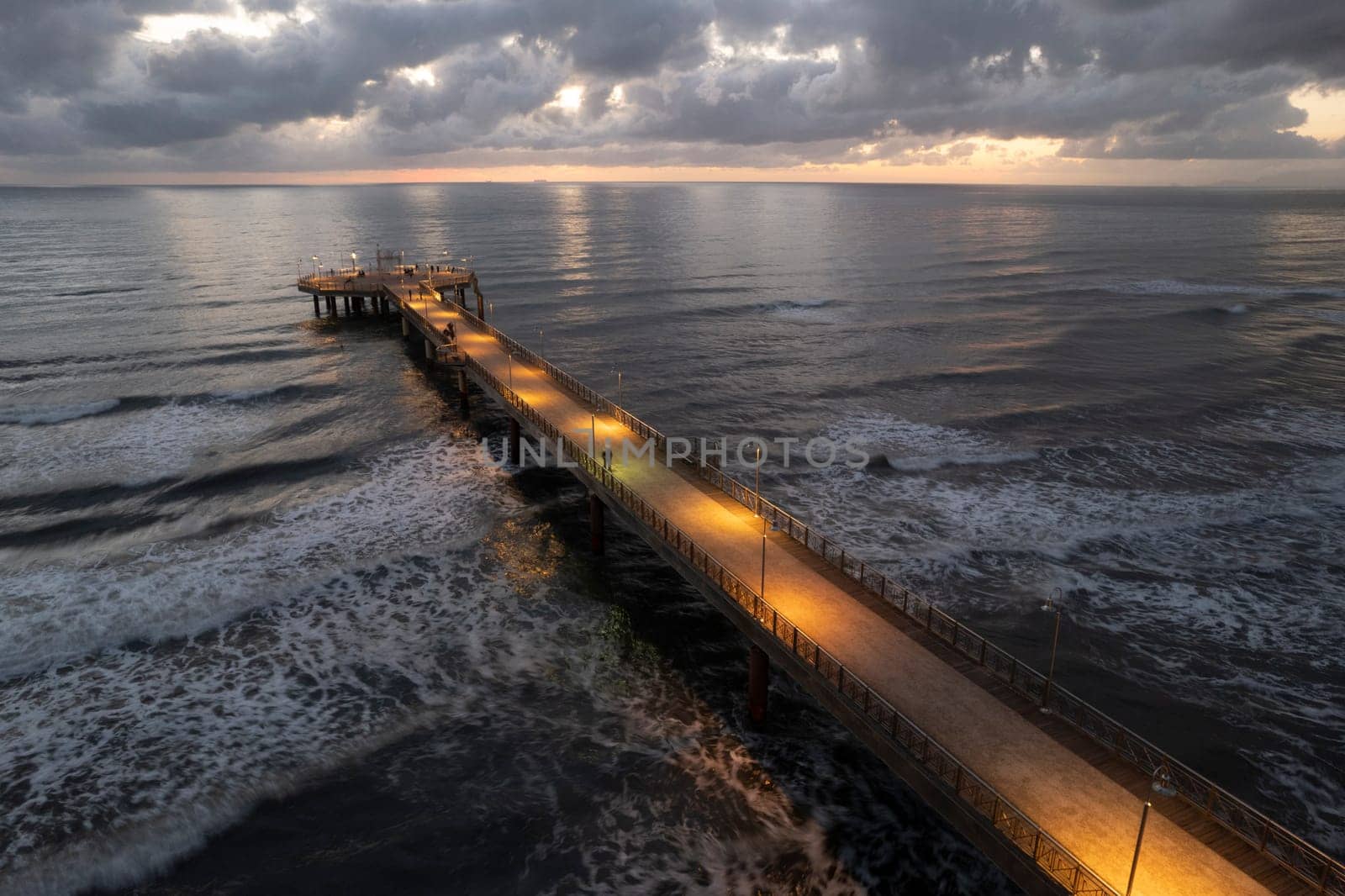 Night aerial view of the pier of Marina di Pietrasanta Versilia by fotografiche.eu