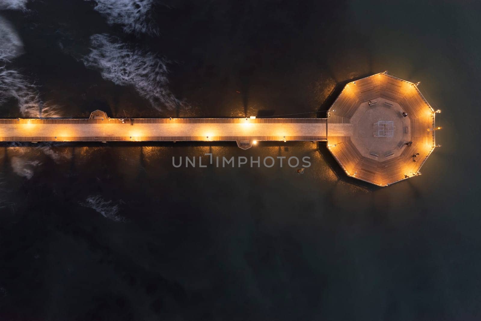 Night aerial view of the pier of Marina di Pietrasanta Versilia by fotografiche.eu