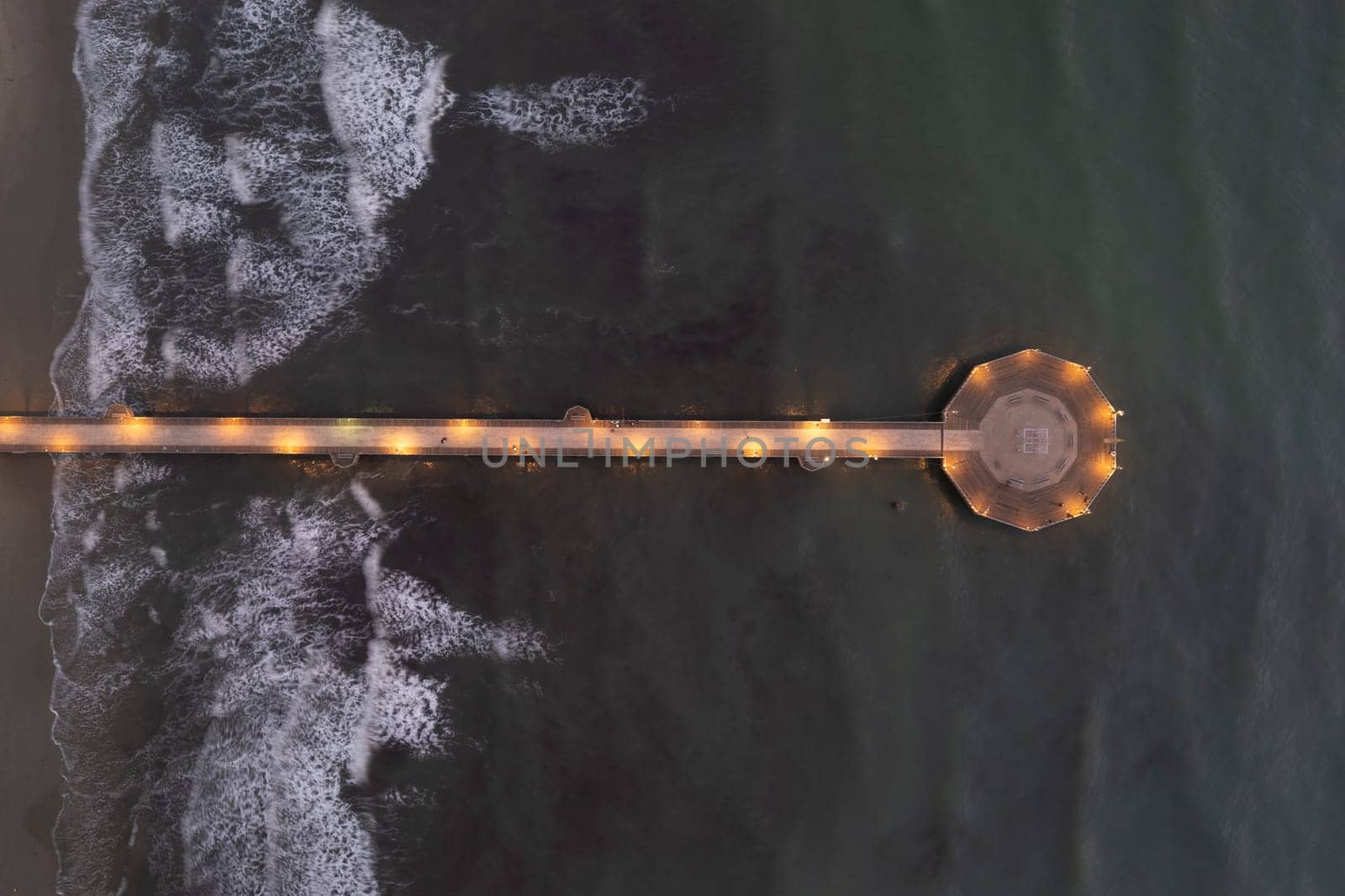 Night aerial view of the pier of Marina di Pietrasanta Versilia by fotografiche.eu