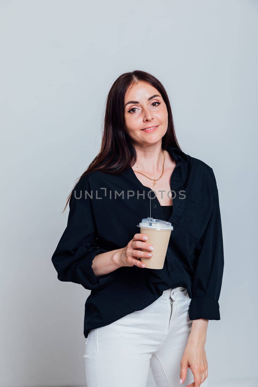 woman with a cup of hot coffee tea
