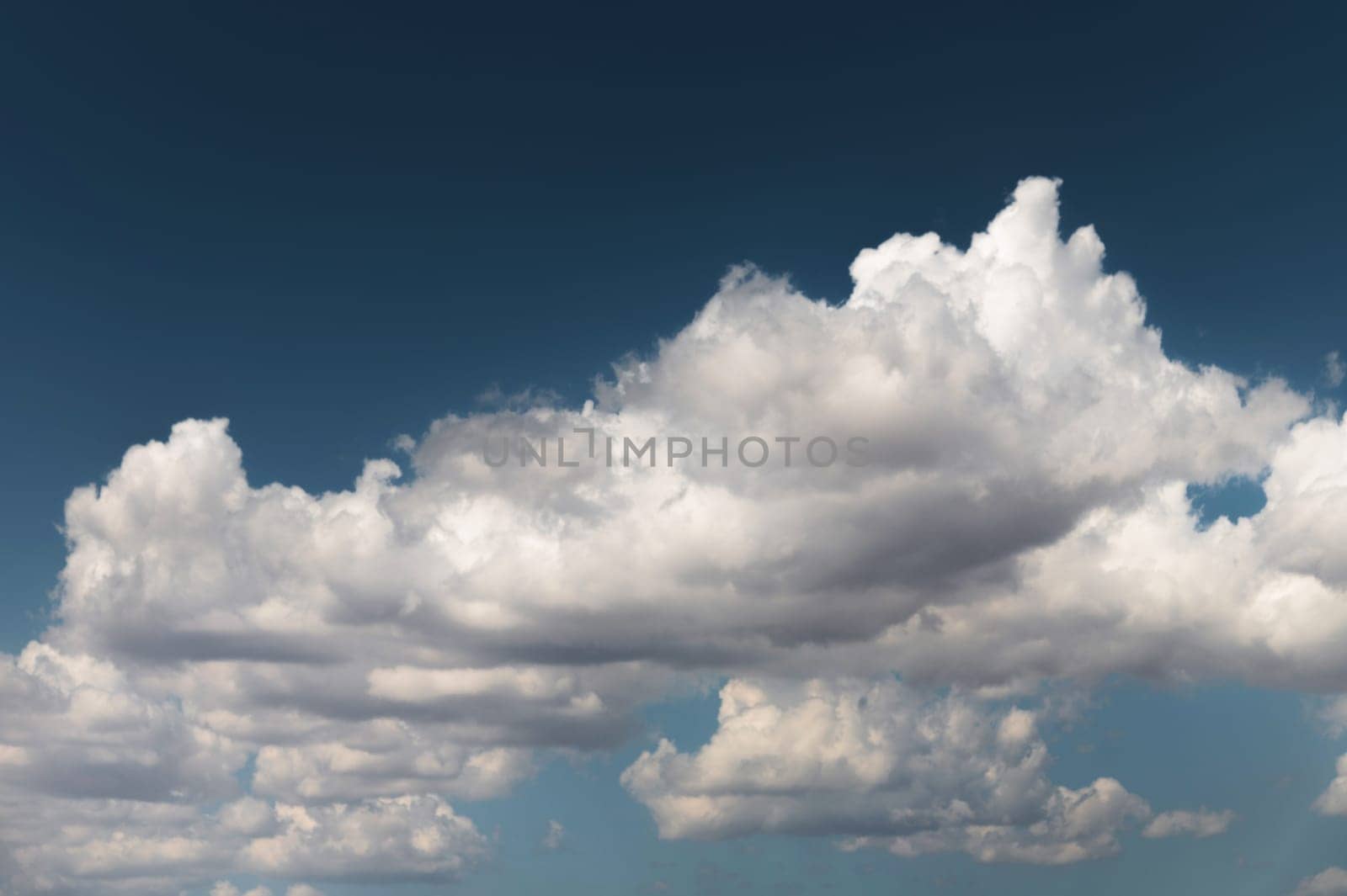Surreal cloud view outdoors on blue sky, soft fluffy clouds. dreamy summer paradise concept.