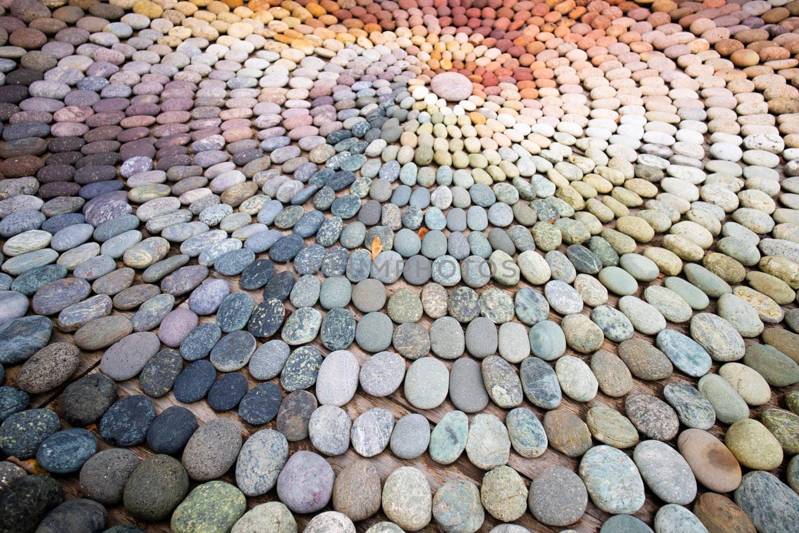 Photographic shot of the multicolor composition of a mosaic made of stones 