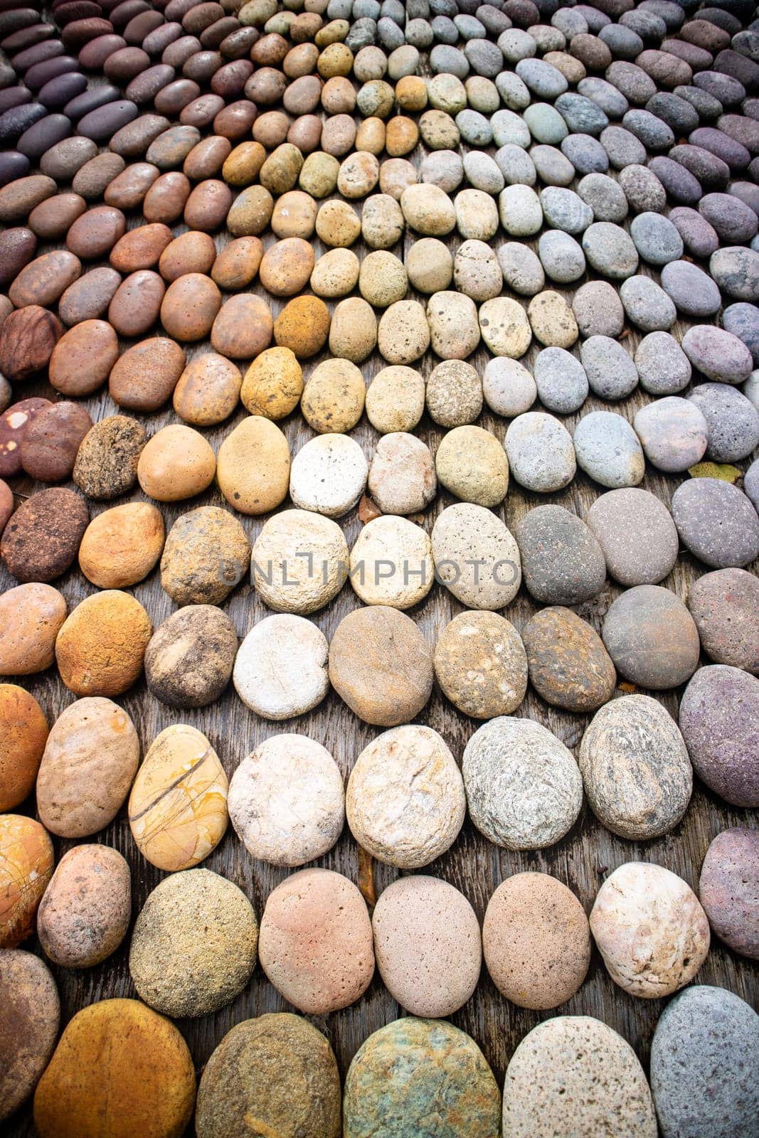 Photographic shot of a mosaic of multicolored stones by fotografiche.eu