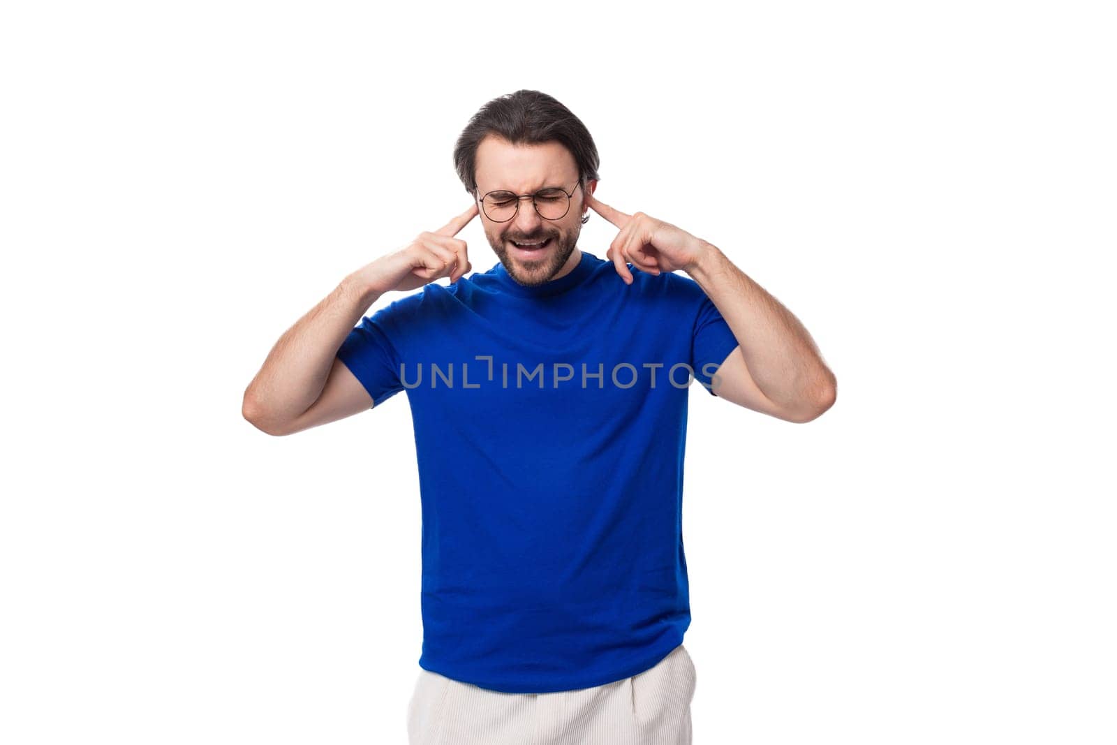 young smart european brunette man with beard thinks about strategy on background with copy space. brainstorm.