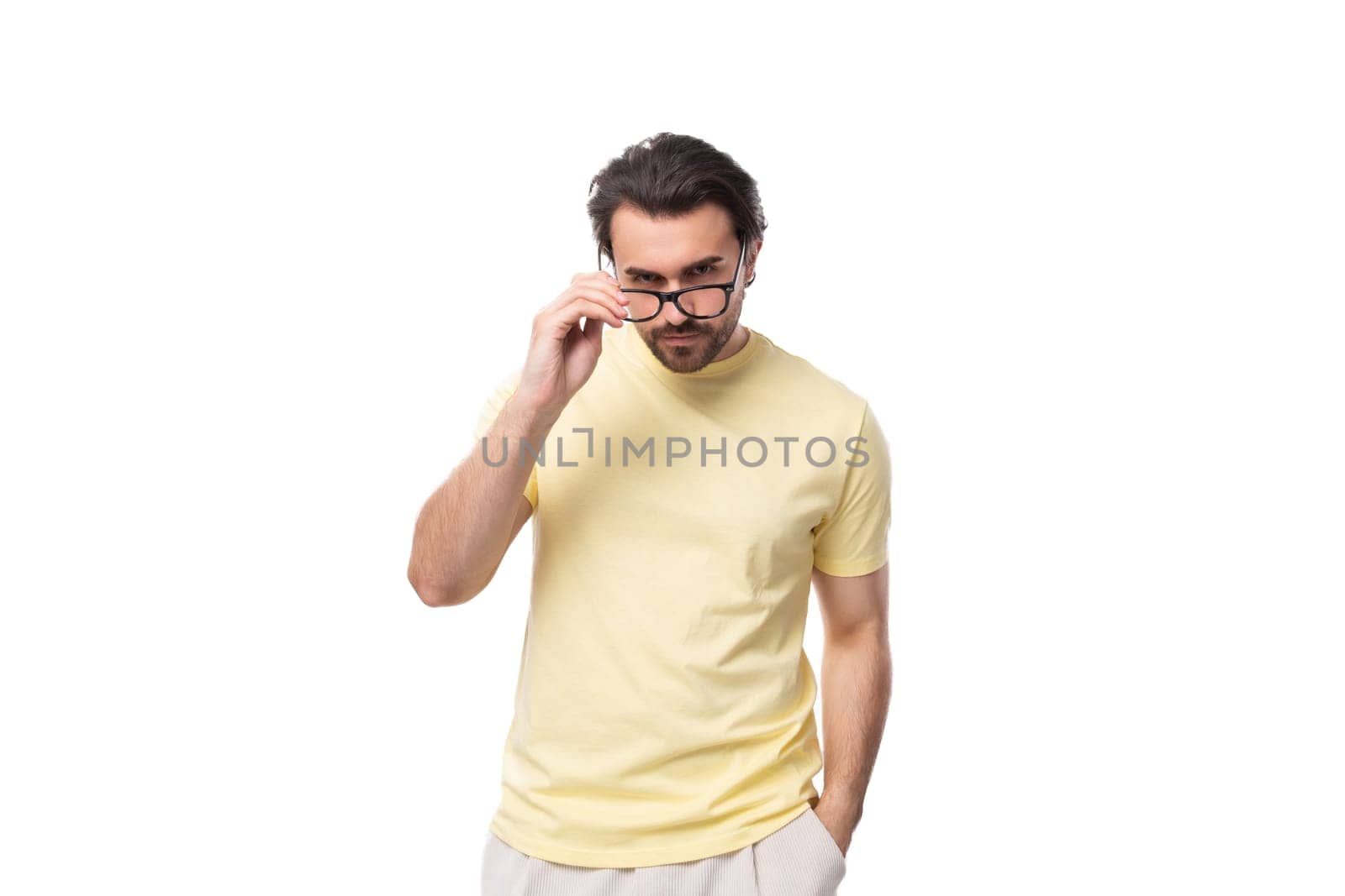 young smart leader european man with beard and mustache dressed in t-shirt wear glasses for image by TRMK