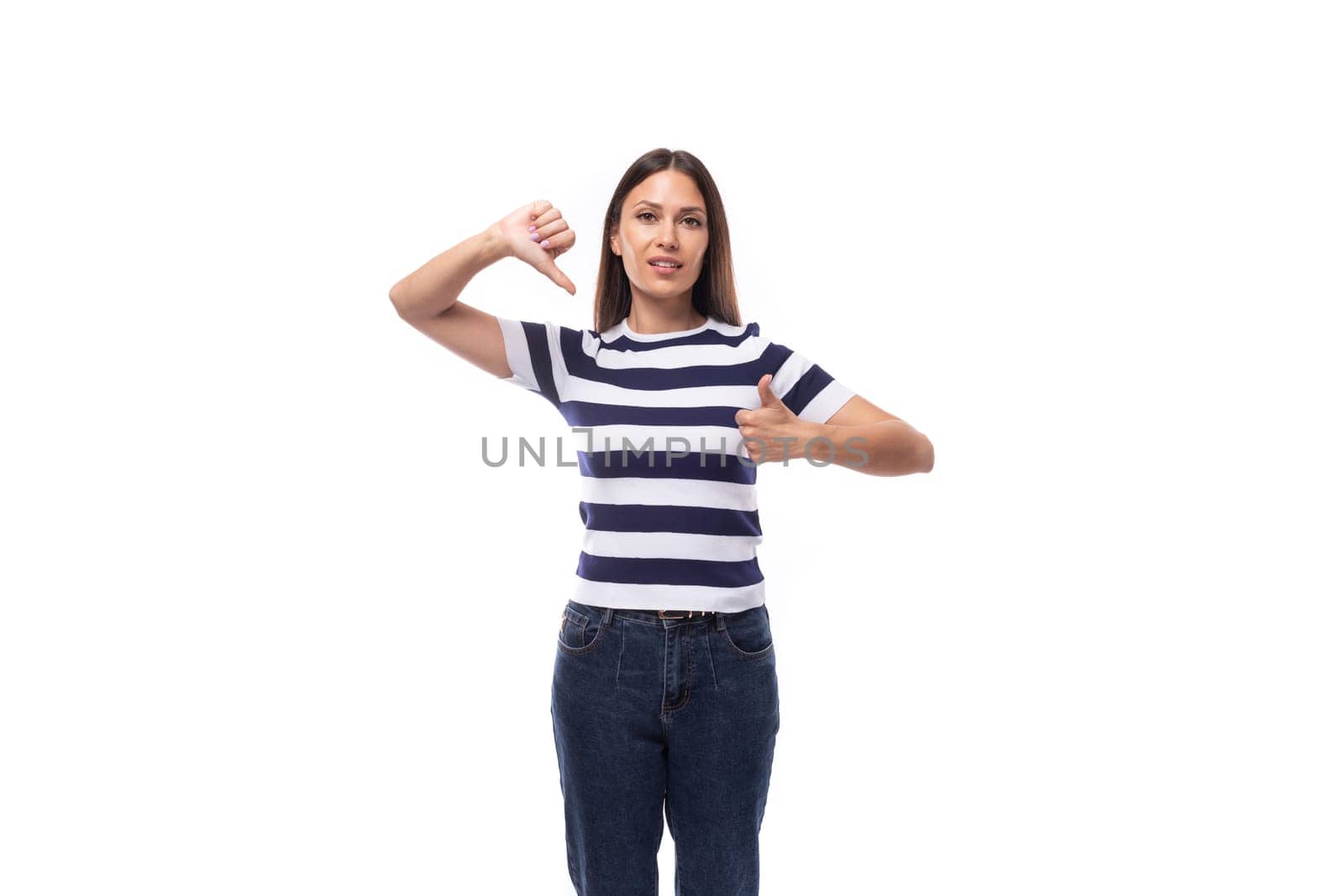 slim young caucasian brunette promoter woman in a striped black and white t-shirt on a white background.