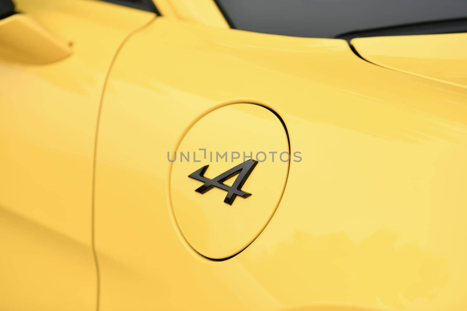 DIEPPE, FRANCE - MAY 14, 2023: Logo of Renault Alpine car classic Cars.