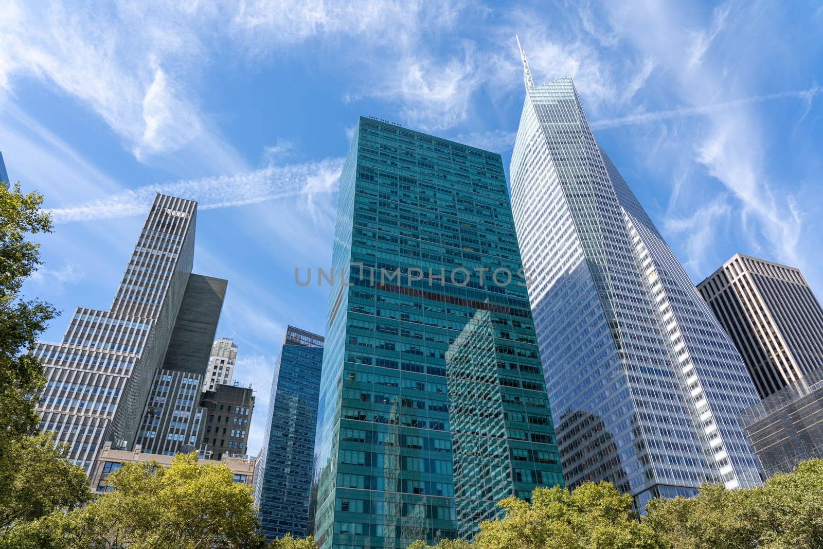 New York, United States of America - September 20, 2019: Skyscrapers as seen from Bryant Park in Manhattan.