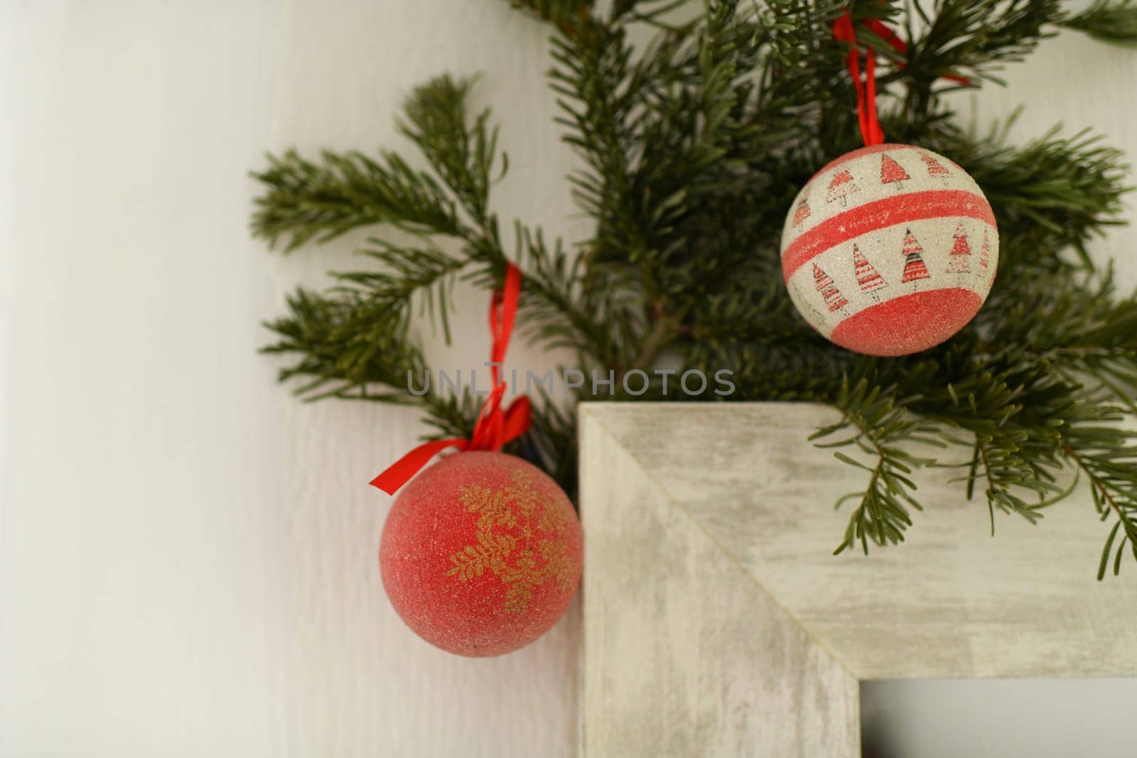 The christmas toys hanging on a Christmas tree branch