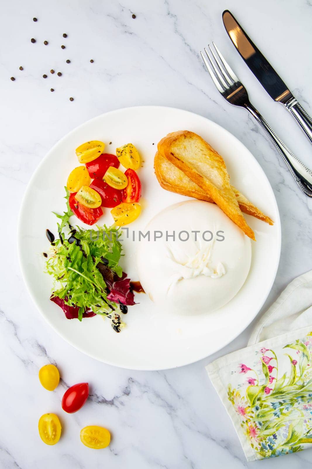 mozzarella with spinach, cherry tomatoes, wild berries and bread side view by tewolf