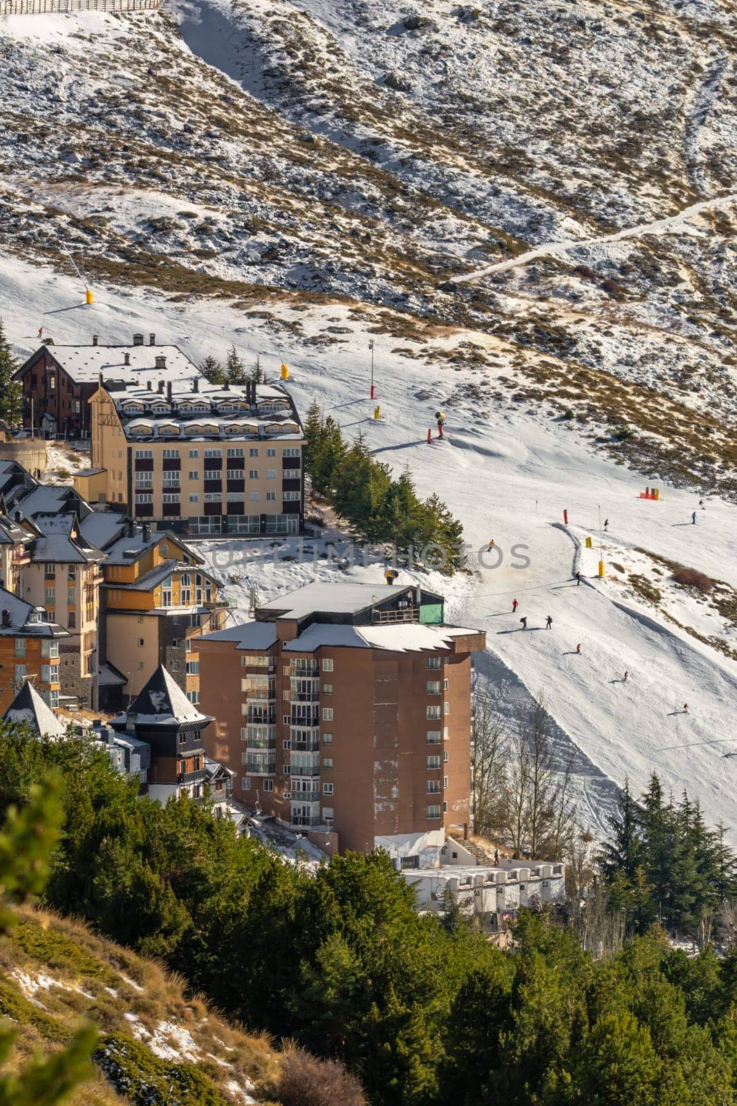 aerial view of ski resort hotels and slopes with skiers, sierra nevada,granada,spain, seasonal concept