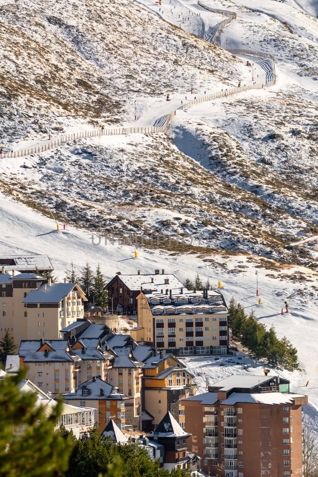 aerial view of ski resort hotels and slopes with skiers, sierra nevada,granada,spain, seasonal concept,
