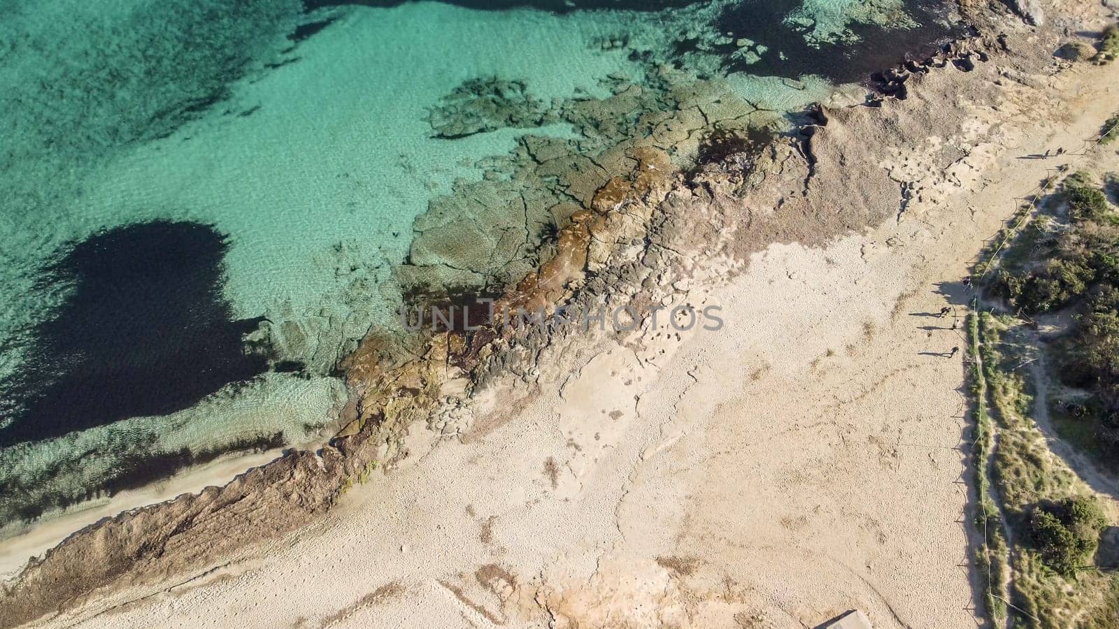 aerial view from drone of a natural paradise beach in the mediterranean, with crystal clear water and white sand. calamillor, Mallorca, Balearic Islands