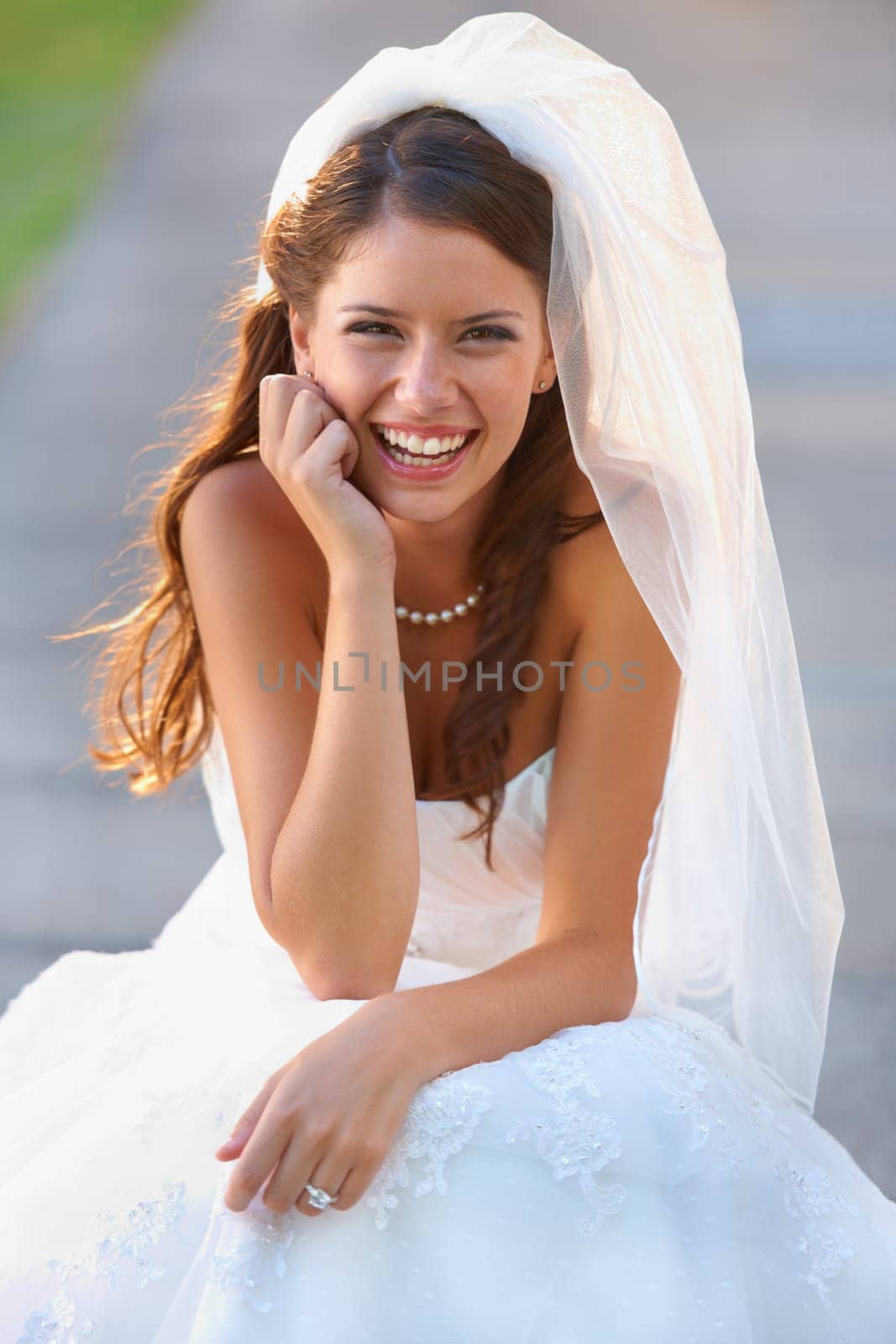 Bride, woman and portrait with smile for wedding, ceremony or celebration outdoor in nature for commitment. Marriage, person and face with dress, joy or happy for event, unity and romance in park.