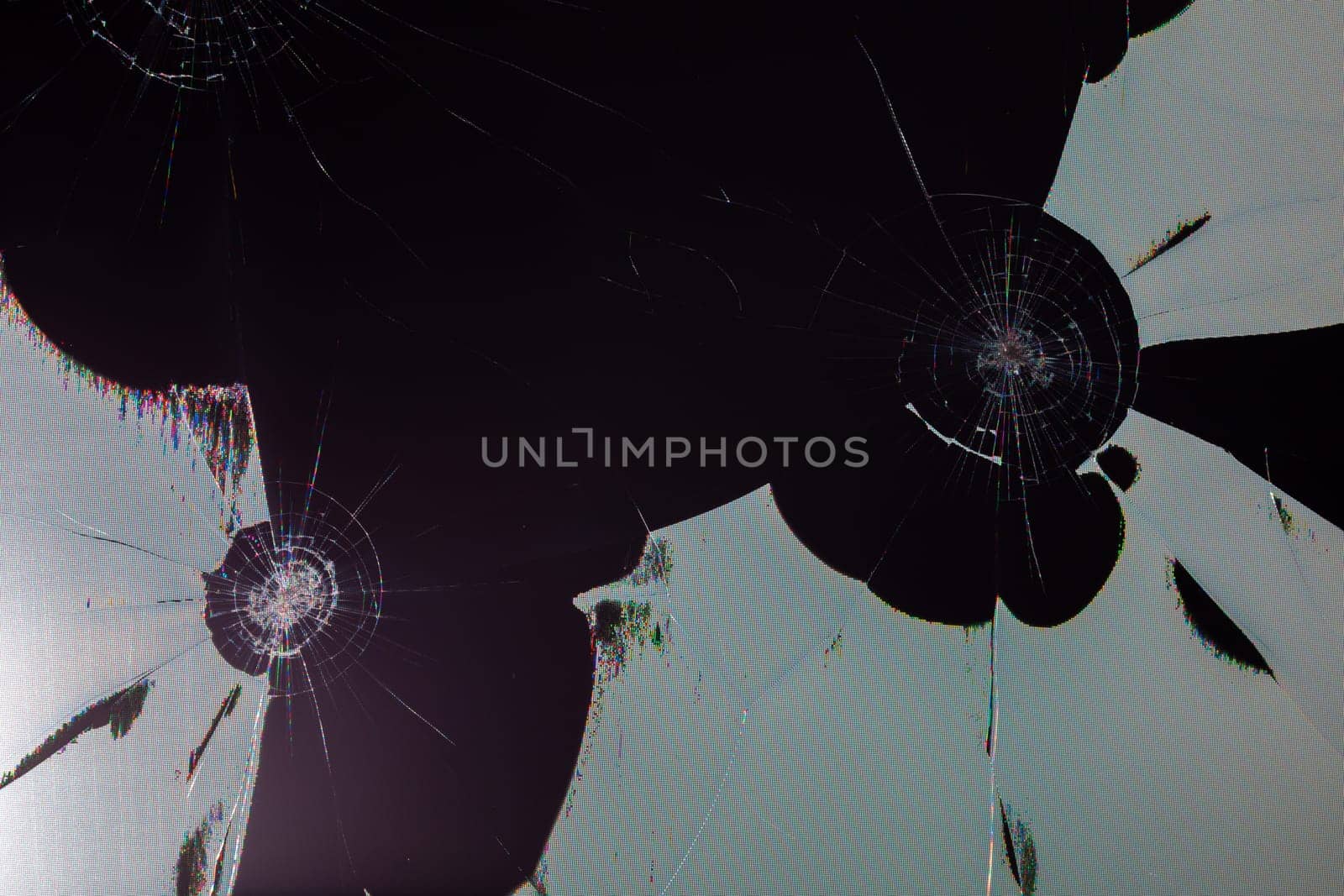 damaged LCD screen with cracks, full-frame background and texture by z1b