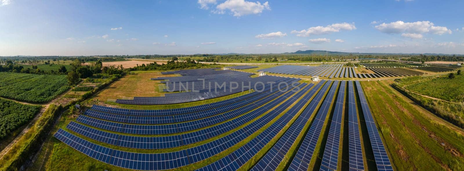 Solar panels sun power on the field in summer aerial view in Thailand Solar panel field by fokkebok