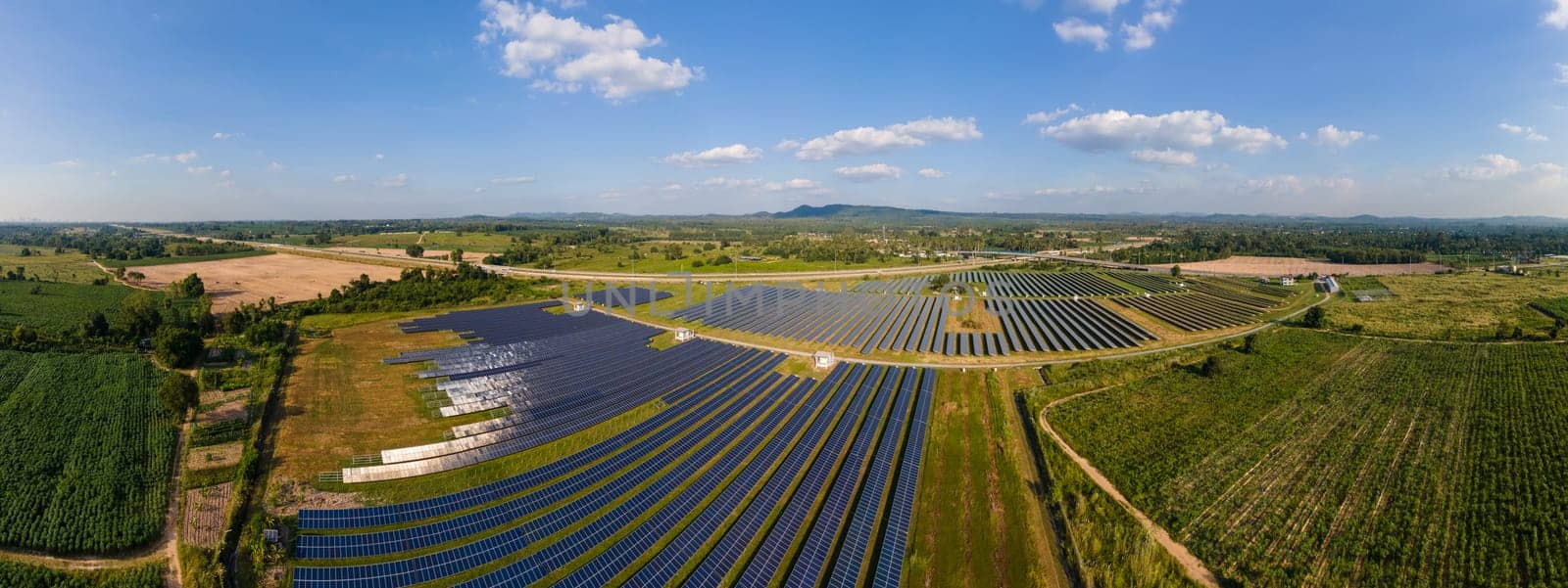 Solar panels sun power on the field in summer aerial view in Thailand Solar panel field by fokkebok