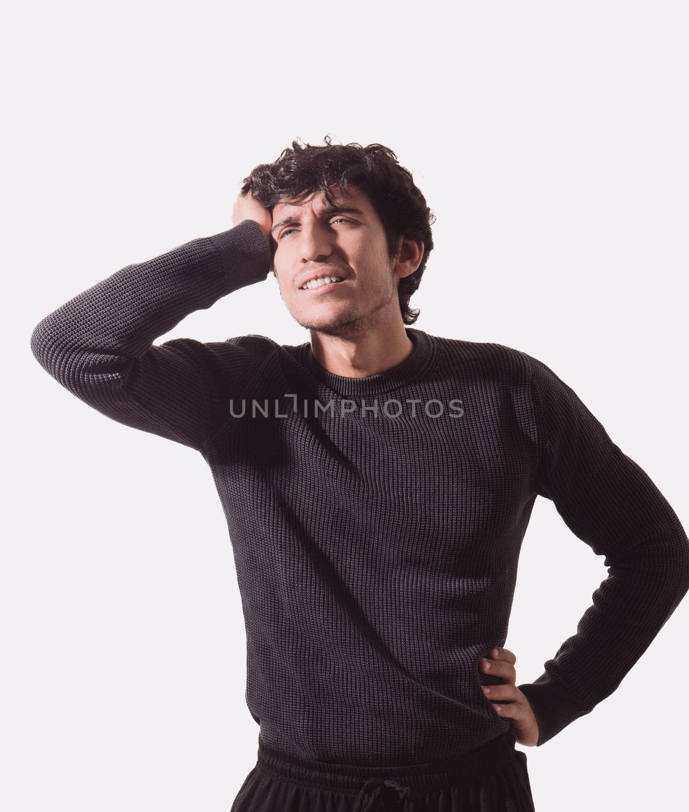 A Stylish Man Striking a Pose with His Hands on His Head by artofphoto