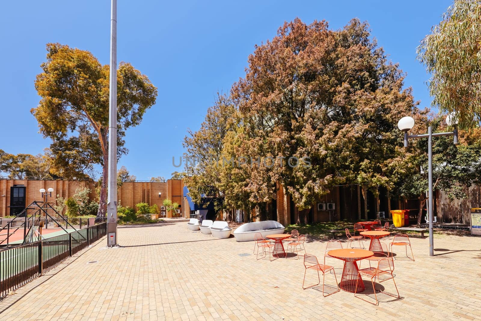 MELBOURNE, AUSTRALIA - NOVEMBER 19, 2023 - Sports fields and architectural details at Melbourne University parkville campus in Melbourne, Victoria, Australia