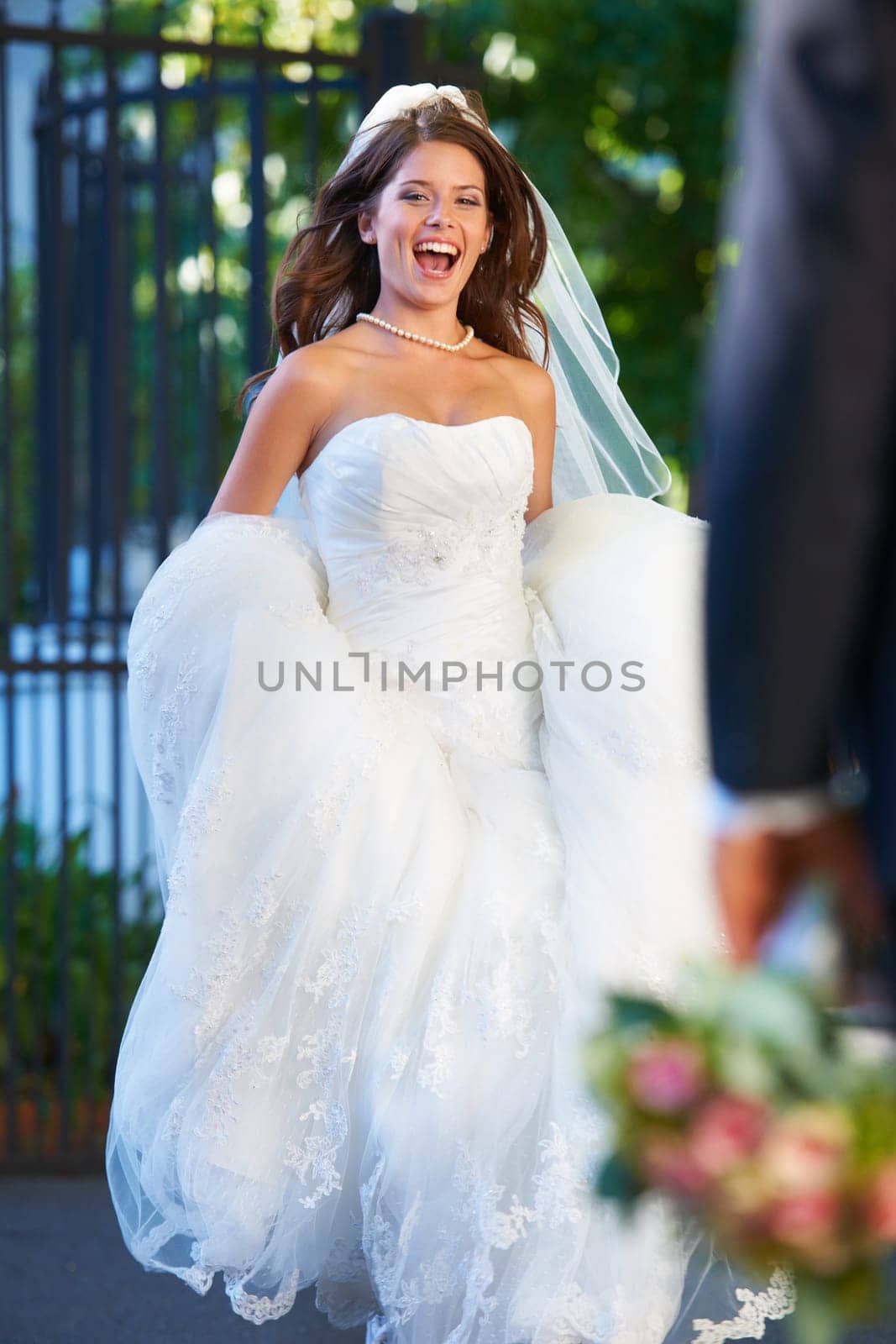 Excited, bride with smile and running outside to groom with flowers, love and marriage celebration. Happiness, commitment and woman in wedding dress with partner, bouquet and romance at reception