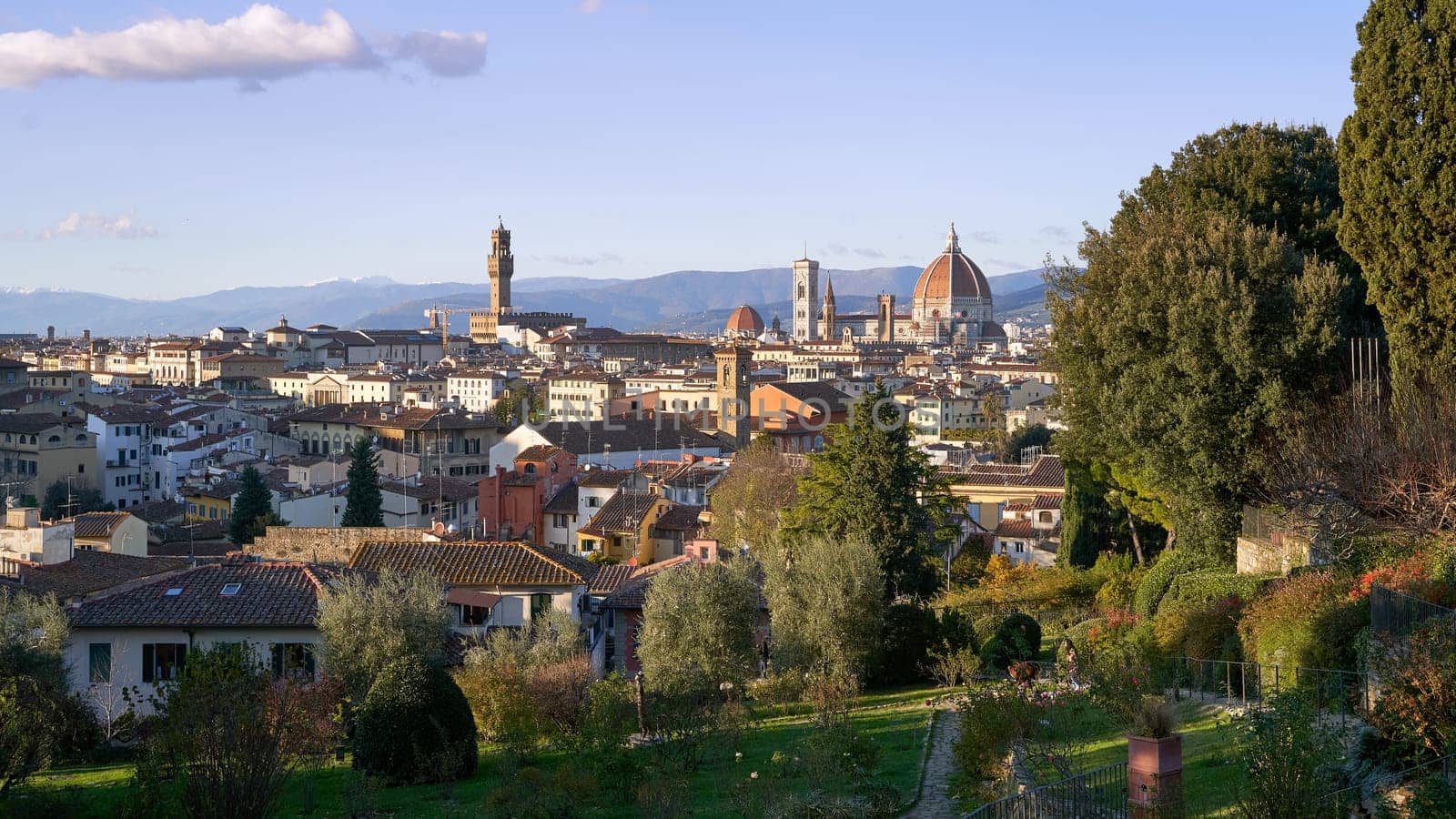 Panoramic view of the old city of Florence from Giardino delle Rose on a sunny evening by berezko