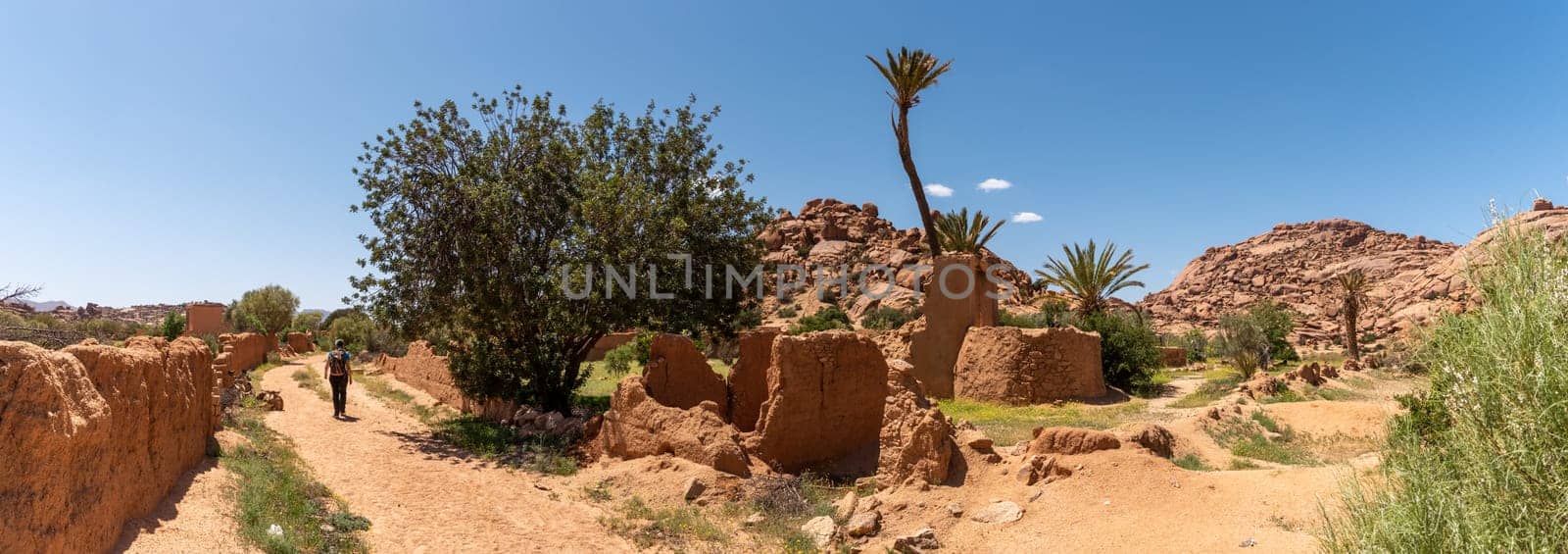 Hiking through the scenic Tafraoute valley in the Anti-Atlas mountains in Morocco