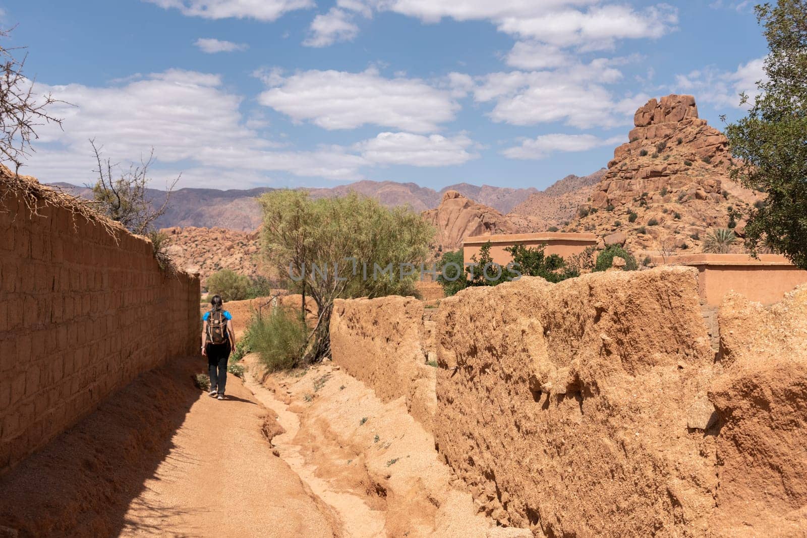 Hiking through the scenic Tafraoute valley in the Anti-Atlas mountains in Morocco