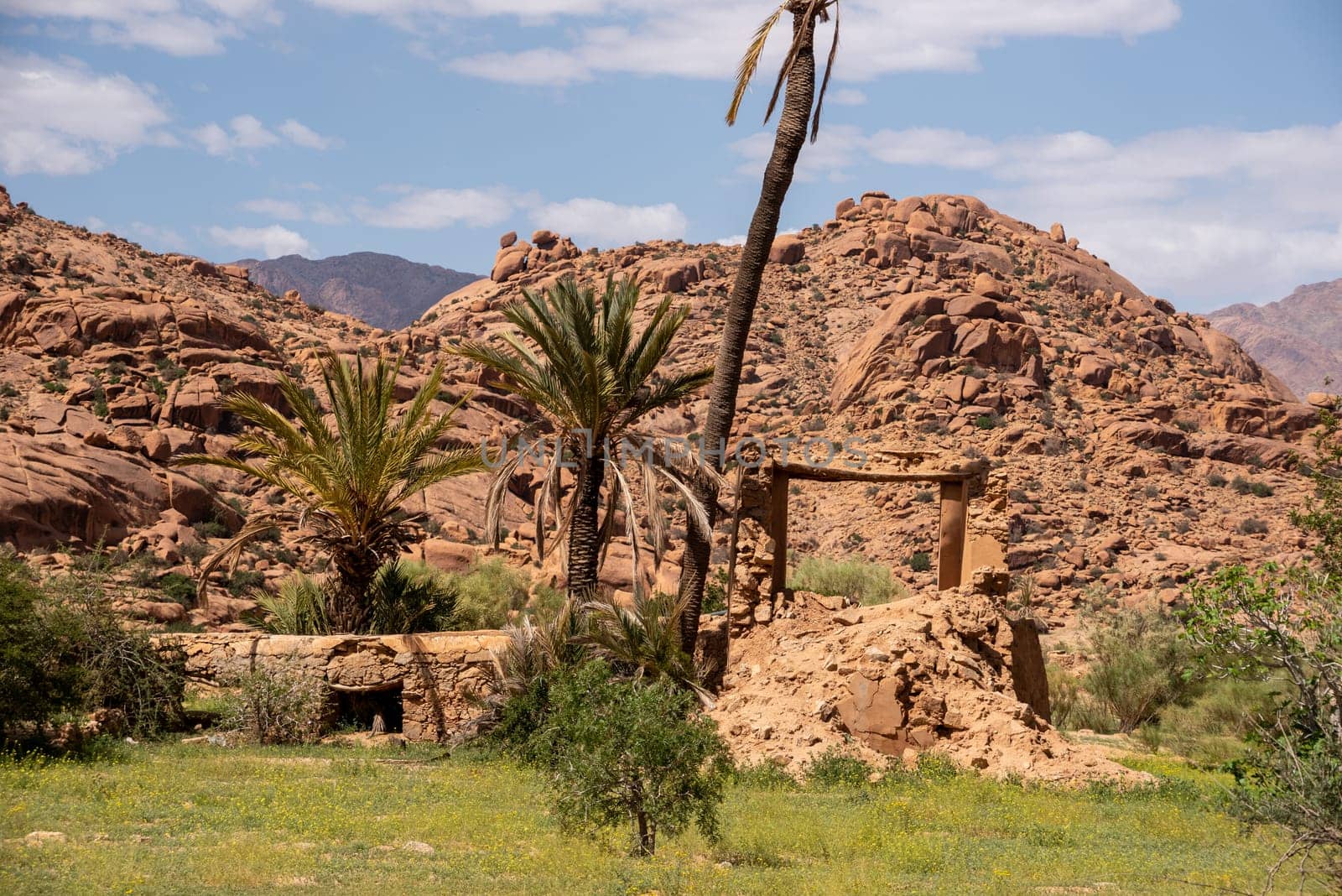 Hiking through the scenic Tafraoute valley in the Anti-Atlas mountains in Morocco