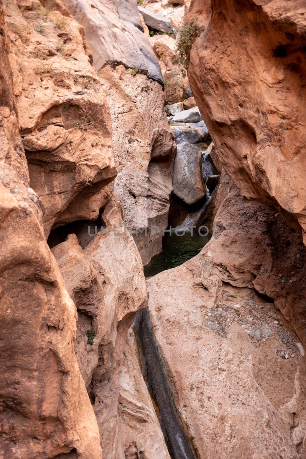Hiking through the iconic Amtoudi canyon in the Anti-Atlas, Morocco