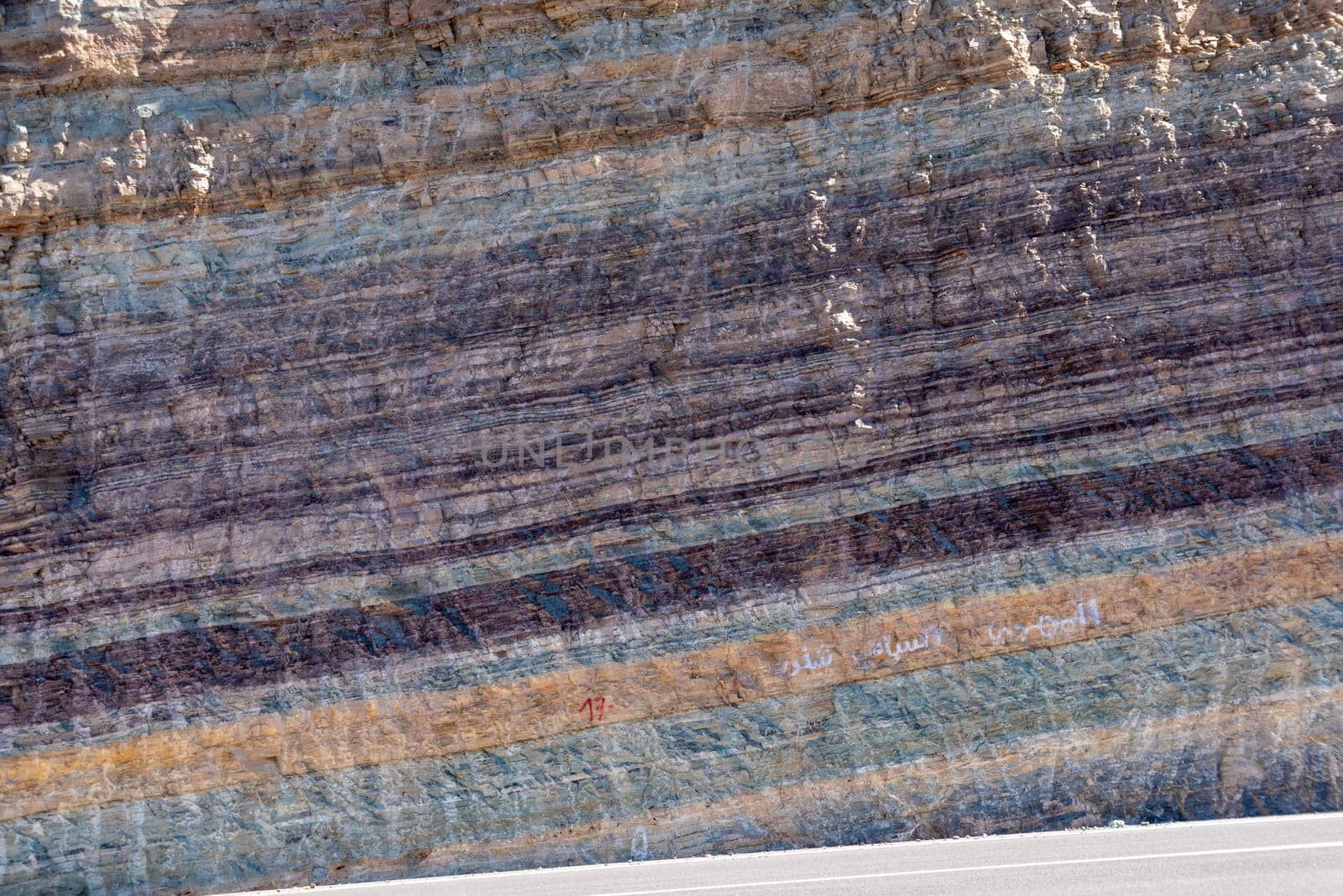 Scenic natural colorful lines of a rock in the Moroccan Anti Atlas mountains