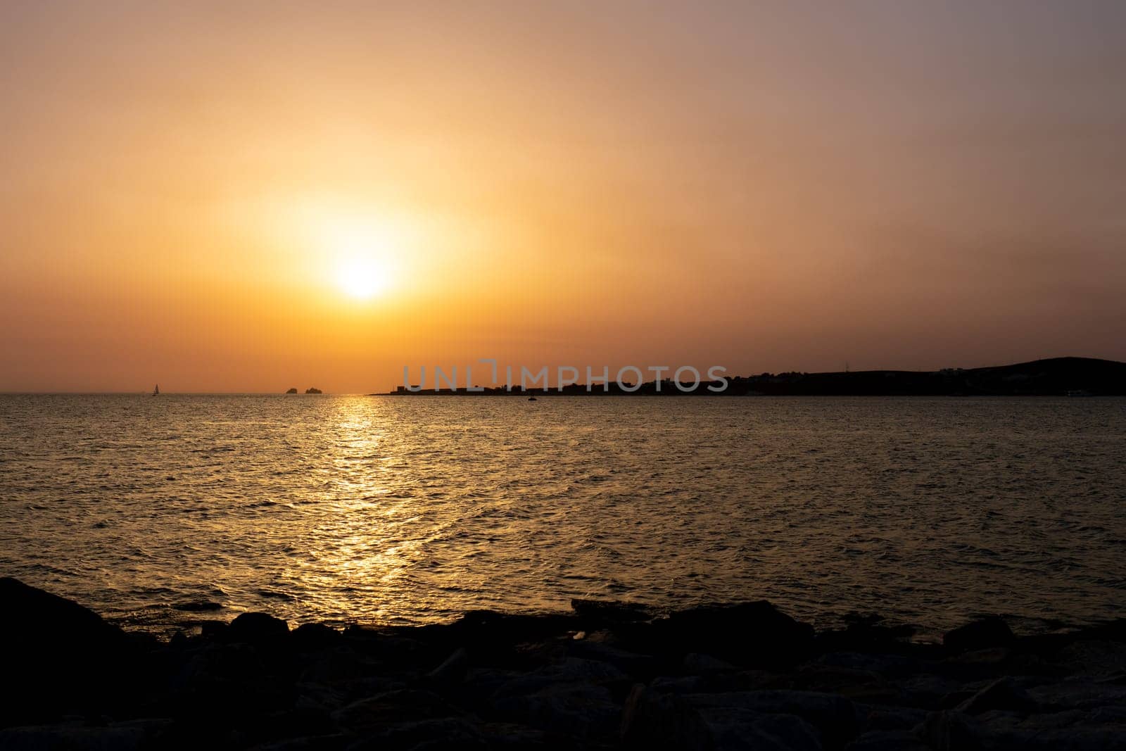 View of the sea at sunset in Paros, Greece