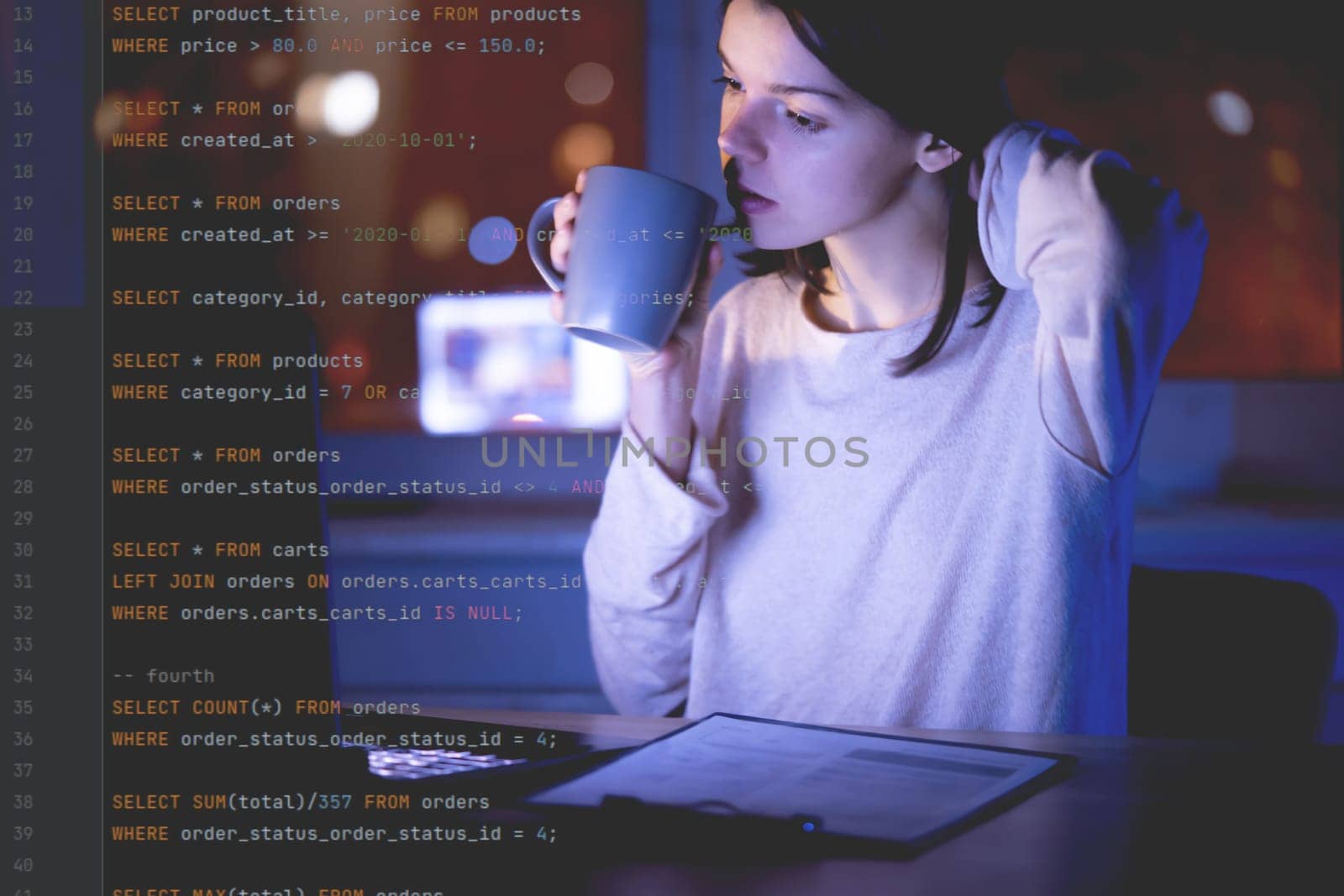 A young girl works on a laptop late at night online, a woman is coding, writing a program, using her device to create a new project and e-learning, getting an IT education for future development.