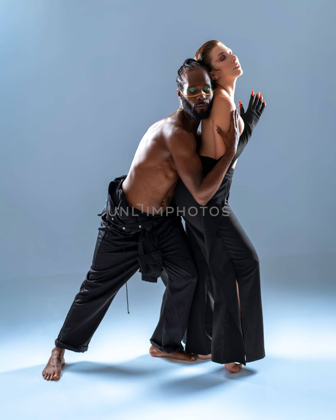 Black gay man hugging woman in dance by andreonegin