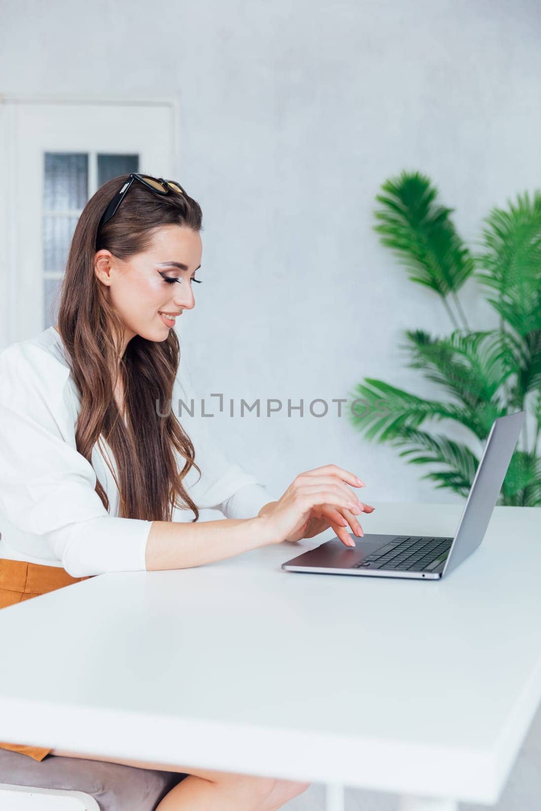 a woman with laptop remote work communication internet conversation online communication