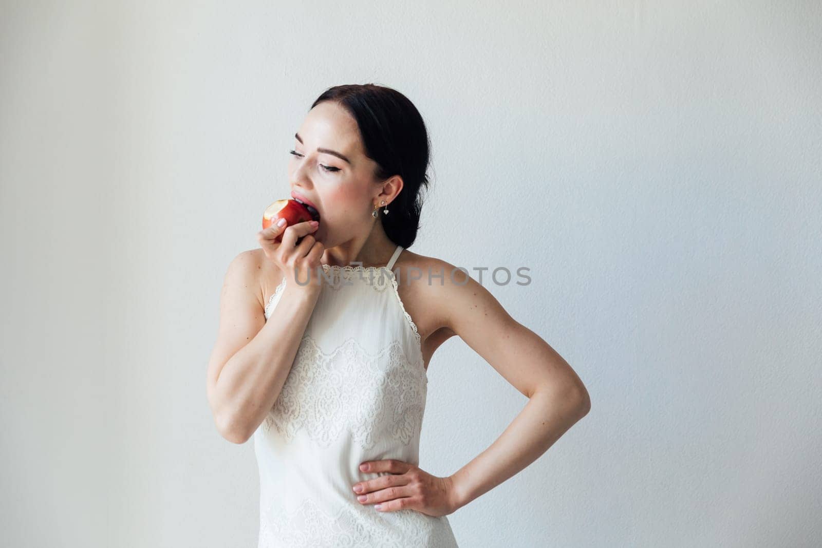 beautiful woman and delicious apple for food by Simakov