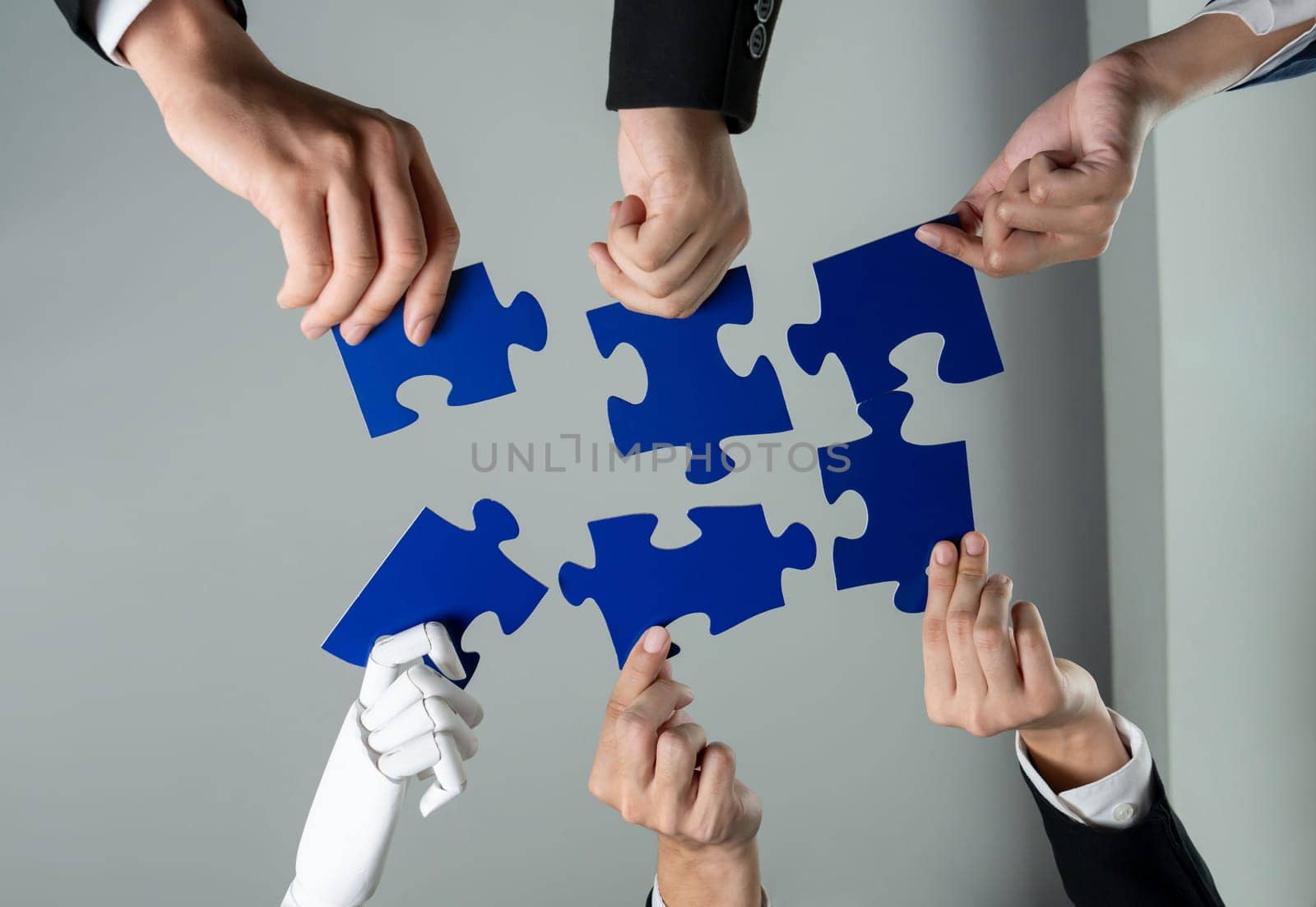 Futuristic HR recruitment with productive automation working in panoramic banner, as AI or artificial intelligence robotic workforce displace human. Robotic hand hold puzzle piece to fill gap. Shrewd