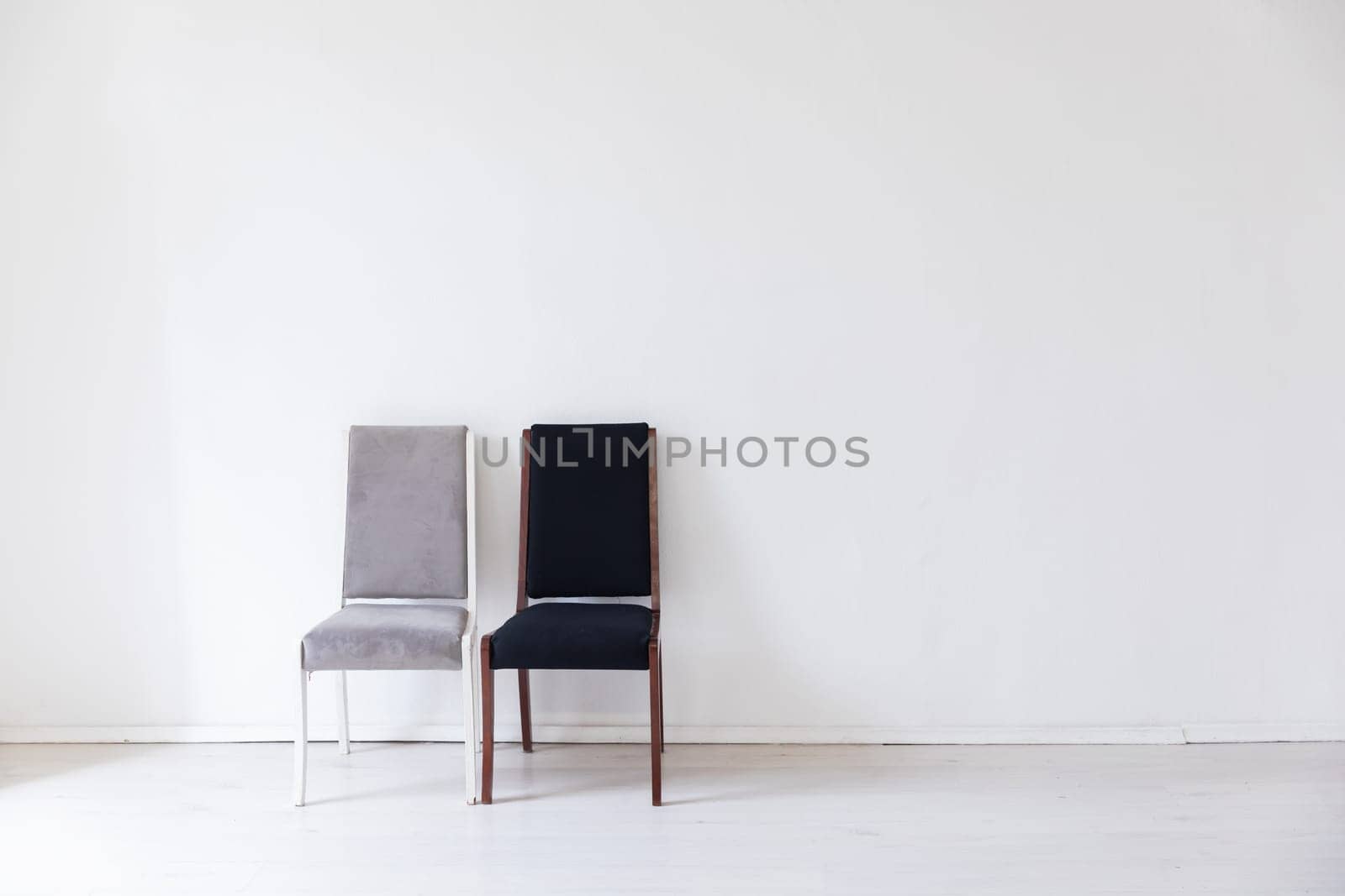 gray black chairs on white background
